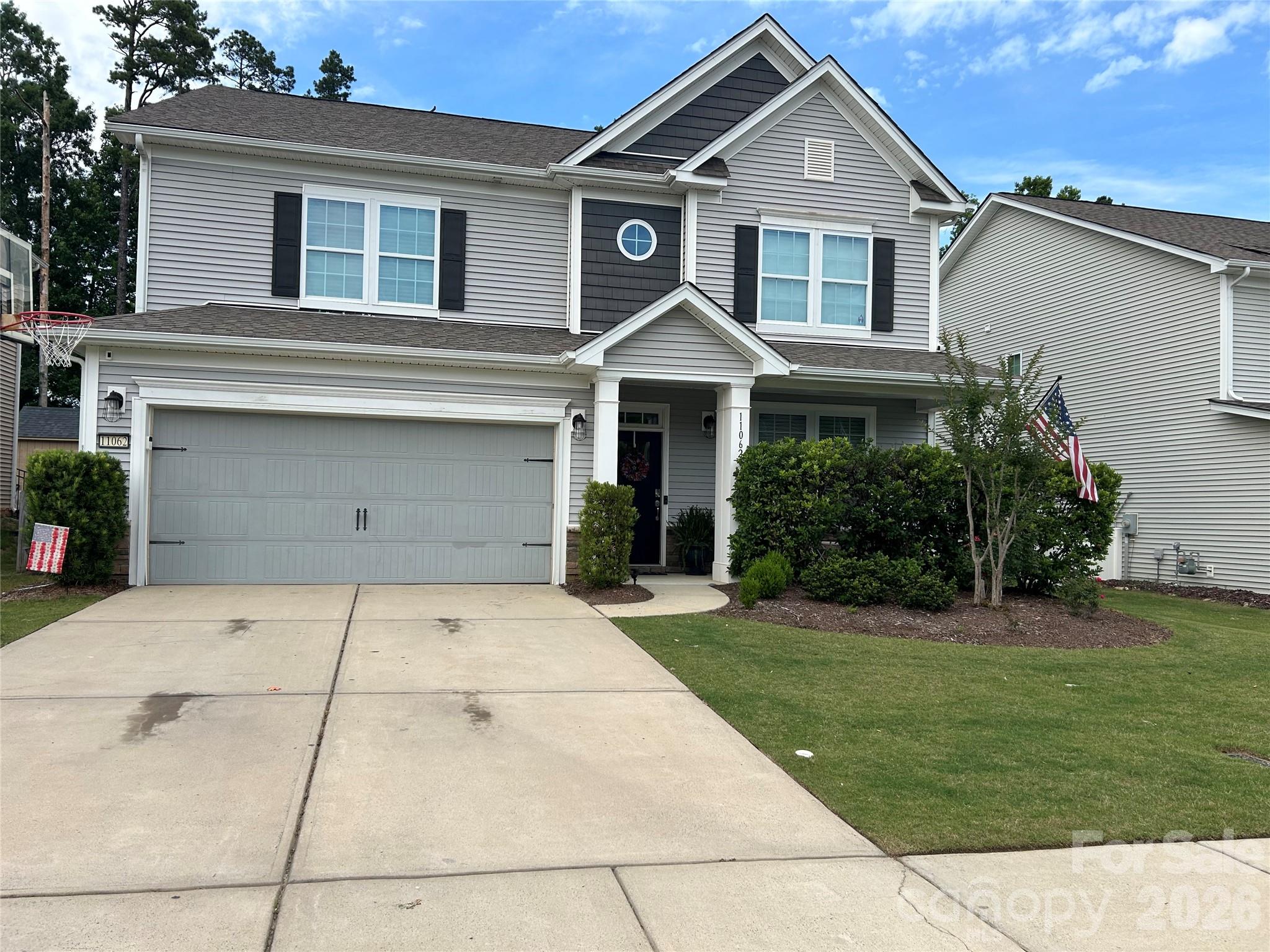 Beautifully maintained one-owner home featuring the highly desirable Hampshire floor plan and backing to a private, tree-lined natural area. Thoughtfully updated and meticulously cared for, this home offers an exceptional blend of space, functionality, and outdoor living.The open-concept main level is designed for both everyday living and entertaining, with the gourmet kitchen flowing seamlessly into the spacious family room featuring a gas fireplace. The kitchen is well-appointed with granite countertops, tile backsplash, gas cooktop, double wall ovens, custom walk-in pantry shelving across from a butler's pantry, abundant cabinet space, and a large center island that serves as a natural gathering space for meals, conversation, and entertaining. A bright breakfast area is conveniently located adjacent to the kitchen, creating an inviting space for casual dining.A main-level bedroom and full bath provide excellent flexibility for guests, multi-generational living, or a private home office.Hardwood flooring extends throughout the main living areas and is complemented by extensive crown molding and upgraded light fixtures throughout the home. Upstairs, the spacious primary suite serves as a private retreat with a sitting area, tray ceiling, and an elegant ensuite bath featuring granite vanity tops, tile flooring, and a tiled shower. A large loft offers additional flexible living space ideal for a media room, playroom, home office, or secondary gathering area. The conveniently located upper-level laundry room is situated near the primary suite and secondary bedrooms, adding everyday convenience to the home’s thoughtful design.Step outside to enjoy the fenced backyard overlooking a peaceful wooded backdrop. The custom paver patio and outdoor kitchen create the perfect setting for entertaining, relaxing, and enjoying year-round outdoor living.With quality upgrades, pride of ownership throughout, and a highly desirable private setting, this move-in ready home offers a rare opportunity for today’s buyers.