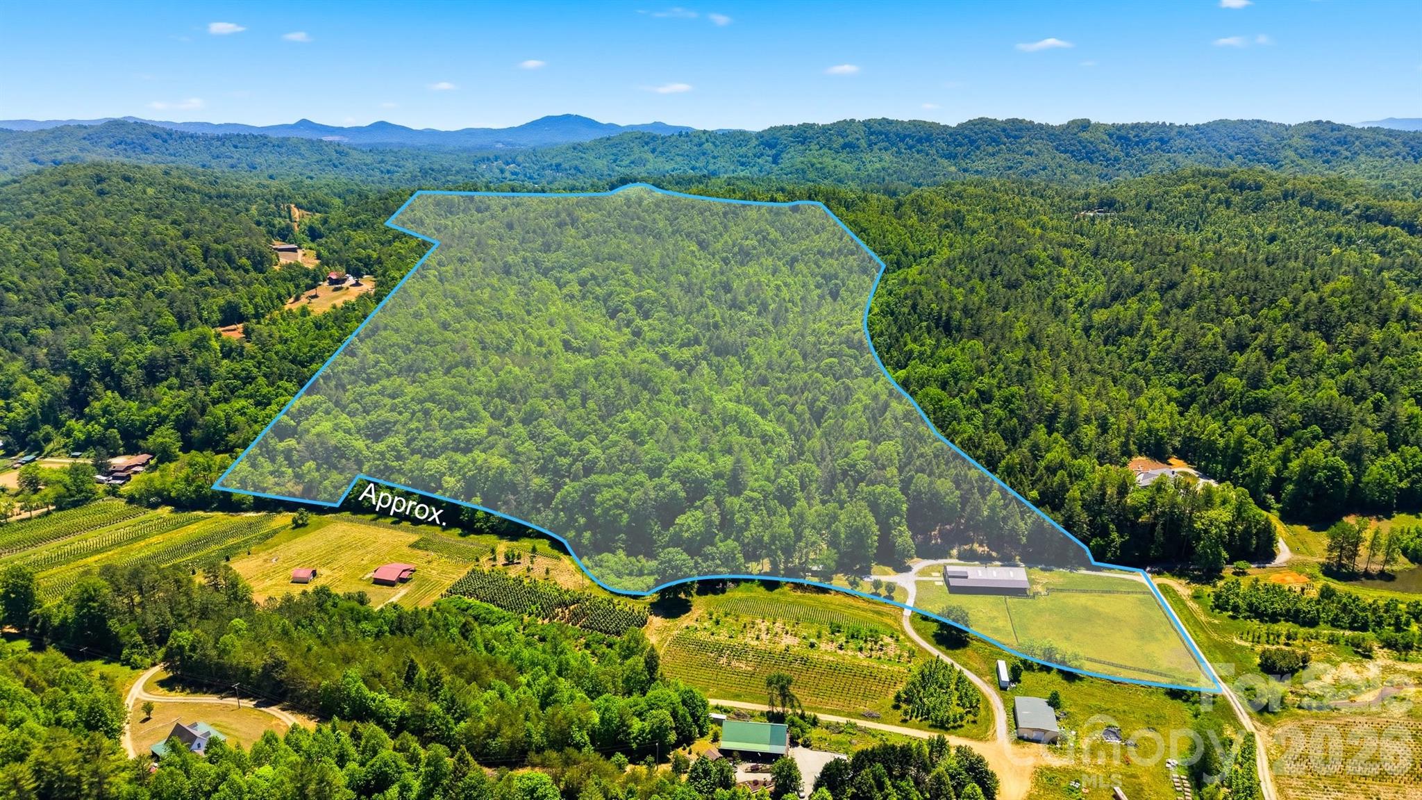 Welcome to this extraordinary 81+/--acre property in the beautiful Happy Valley area, just 25 minutes from Blowing Rock. With Mulberry Creek greeting you at the entrance and meandering throughout the property, plus an additional creek on the acreage, this land offers natural beauty, privacy, and endless opportunity.The renovated rustic 2-bedroom, 1-bath cabin is full of charm and ideal as a full-time residence, weekend getaway, or vacation rental. The property also features an impressive nearly 4,600 square foot barn complete with 6 stalls (with the option for 3 additional stalls already plumbed for water), tack room, wash stall, office, fenced riding area, and separate living quarters above—perfect for a caretaker apartment or true barn living.Whether you’re dreaming of a private estate, family compound, equestrian facility, development, or investment property with vacation rentals, this property can bring your vision to life. Multiple level build sites, cut in roads and riding trails throughout the wooded acreage, and close proximity to the Blue Ridge Horseman’s Association trails make this a rare offering.Come explore all this incredible property has to offer—life is truly better with land.