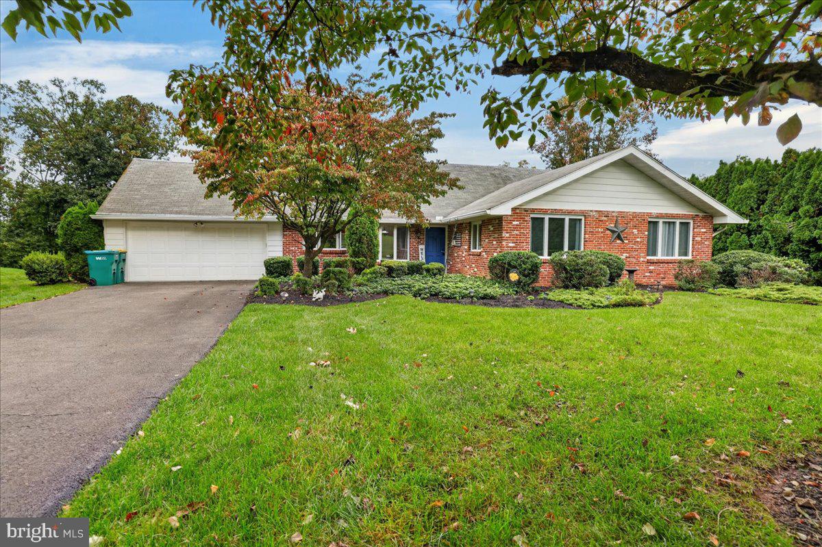 Welcome to the ease and comfort of one-level living in this beautifully updated 3-bedroom, 2-full-bath ranch home, where charm, functionality, and thoughtful improvements come together! From the moment you step inside, you’ll appreciate the inviting open floor plan, designed for both comfortable everyday living and effortless entertaining.At the heart of the home is the beautifully renovated custom kitchen, featuring stylish new cabinetry, stainless steel appliances, abundant storage, and a seamless connection to the dining area. Whether preparing a quiet dinner at home or hosting family and friends, this thoughtfully designed space offers both beauty and practicality.The spacious living and dining areas flow effortlessly together, anchored by a striking brick fireplace that adds warmth, character, and architectural interest to the heart of the home. Just beyond, the incredible four-season sunroom is a true standout feature! Filled with natural light, this versatile retreat offers the perfect setting for morning coffee, afternoon reading, casual gatherings, or simply relaxing and enjoying the changing seasons—all from the comfort of your own home.All three generously sized bedrooms feature impressive floor-to-ceiling closets, providing exceptional storage and organization. The home’s convenient single-level layout makes everyday living a breeze, while the walk-up attic presents an exciting bonus! Offering an abundance of additional storage, this expansive space also provides potential opportunities for future finished living space.An oversized two-car garage completes the picture, offering generous room for vehicles, additional storage, a workshop, or hobby space.And the location is another reason to fall in love! Ideally situated in the desirable Langhorne area of Bucks County, this home offers convenient access to Route 1 and I-295, with easy connections to I-95 and the Pennsylvania Turnpike. Commuters will appreciate the accessibility to Philadelphia, Princeton, and surrounding employment centers, while nearby shopping, restaurants, grocery stores, parks, and recreational opportunities make everyday errands and weekend outings especially convenient. Enjoy proximity to Oxford Valley Mall, Sesame Place, and the charming shops and restaurants of historic Langhorne Borough. With so much to explore just minutes from your doorstep, this location offers the perfect balance of neighborhood comfort and regional convenience.Combining the simplicity of ranch-style living, beautifully updated spaces, exceptional storage, and a highly convenient Bucks County location, this home is truly a wonderful opportunity!Don’t miss your chance to make it yours. Schedule your private showing today!
