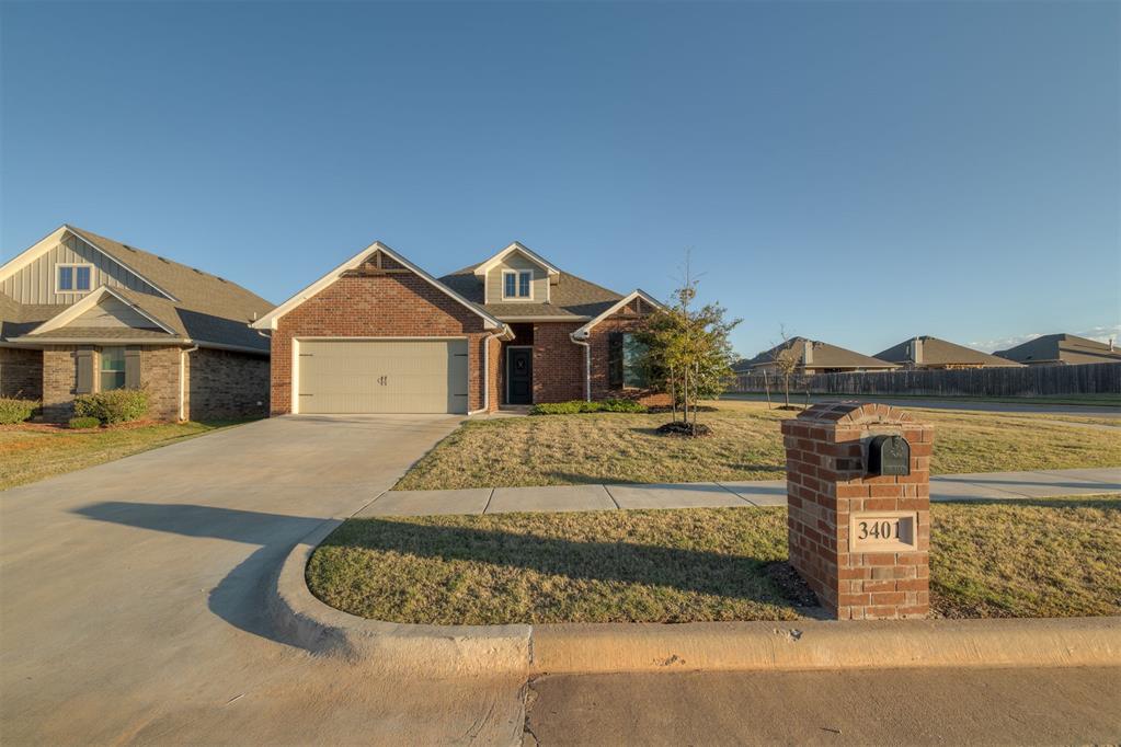 Welcome to this beautifully maintained, one-story home situated on a desirable corner lot in the Ironstone addition! Built in 2021, this 3-bedroom, 2-bathroom home offers 1,631 square feet of thoughtfully designed living space with stylish finishes and an inviting open-concept layout.The spacious living room features a beautiful fireplace with a stone surround, wood-look tile flooring, and plenty of room to relax or entertain. The kitchen is a standout with granite countertops, a large center island with breakfast bar seating, stainless steel appliances, gas range, decorative tile backsplash, and abundant cabinetry. The adjoining dining area creates an easy flow for everyday living and gatherings.The primary bedroom features a vaulted ceiling and generous natural light, while two additional bedrooms provide flexibility for guests, a home office, or additional living needs. Both bathrooms feature granite countertops and attractive finishes.Outside, the brick exterior, welcoming front entry, and corner lot add to the home's curb appeal. An attached two-car garage includes an in-ground storm shelter for added peace of mind during Oklahoma storm season.Located in the Ironstone community with convenient access to shopping, dining, and major thoroughfares, this home combines modern finishes, functional living spaces, and a fantastic Edmond location. Schedule your private showing today!