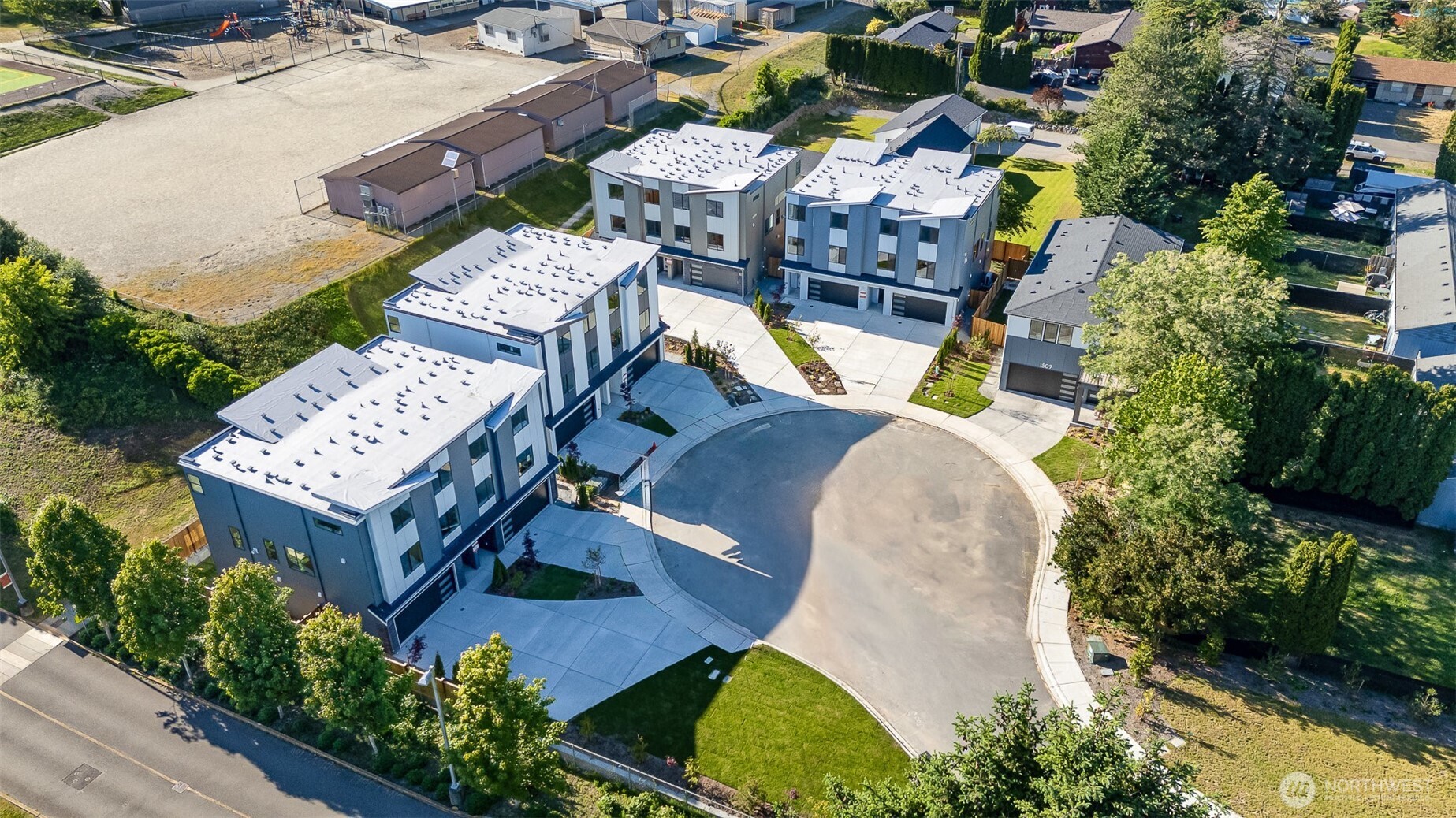 **Rates as low as 3.375% with 2/1 Buydown!**  Only townhome community with fenced yards. Experience elevated living in Lot 4B at Shelton Grove by MSR Communities — a premier cul-de-sac residence in South Bothell. This 2,478 sq ft home offers 4 generous bedrooms, 3.5 baths, a main-level office, and a spacious rec room. The chef’s kitchen impresses with a walk-in pantry, premium sink with cup wash, quartz counters, and upgraded designer cabinetry. Luxurious features include smart mirrors in all bathrooms, a smart toilet in the primary suite, upgraded tile finishes, premium LVP flooring, EV charging, and a gas BBQ hookup on the balcony + too many upgrades. Nestled in a commuter-friendly location with access to top-rated Northshore Schools.