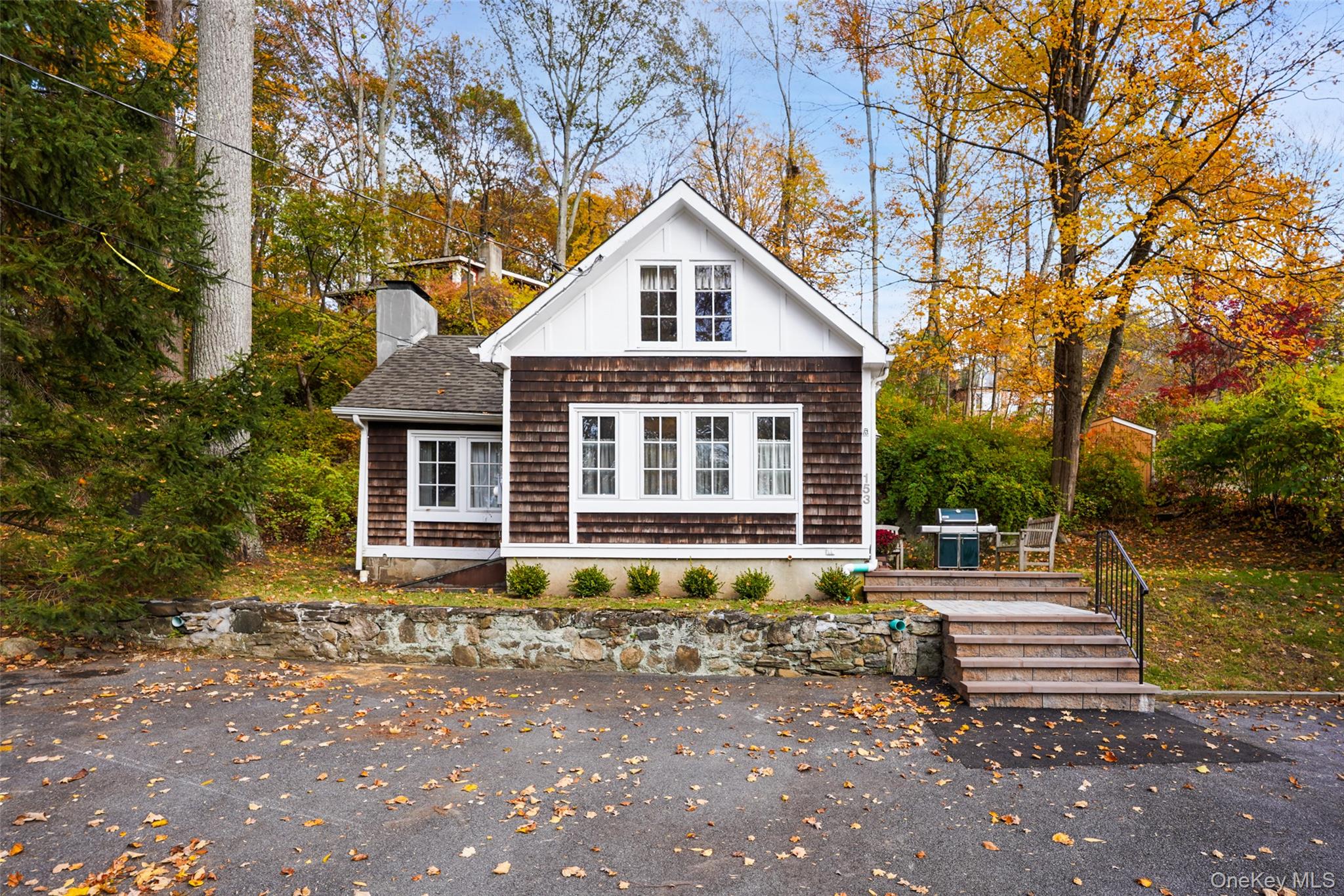 Set in peaceful Lake Kitchawan neighborhood in Lewisboro, this charming cottage-style home offers 2 bedrooms, 1 bath, and approximately 876 square feet of living space. The interior features a light-filled living room with lake views, dining area, and  eat-in kitchen with a comfortable flow ideal for everyday living or weekend use.Located across the street from Lake Kitchawan, the property provides a quiet, natural setting with outdoor space to relax and enjoy the lake and surrounding woods while still offering convenient access to nearby towns and commuting routes. A great opportunity for a low-maintenance primary residence, weekend retreat, or investment property.