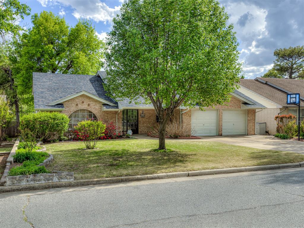NEW ROOF APRIL 2026Beautifully maintained and updated brick tri-level home in a prime central location near shopping, dining, and entertainment, and in Putnam City Schools. This home offers a spacious and flexible layout with multiple living areas. The entry level features a welcoming foyer, a comfortable living room, laundry room, and powder bath. The lower level includes the kitchen, a second living/den area, a separate dining space, and a large primary suite with private bath. Upstairs you’ll find three generously sized bedrooms with great closet space and a large updated bathroom featuring double vanities, quartz countertops, and recently tiled tub and shower walls. A wonderful home with space for everyone and convenient access to everything OKC has to offer.