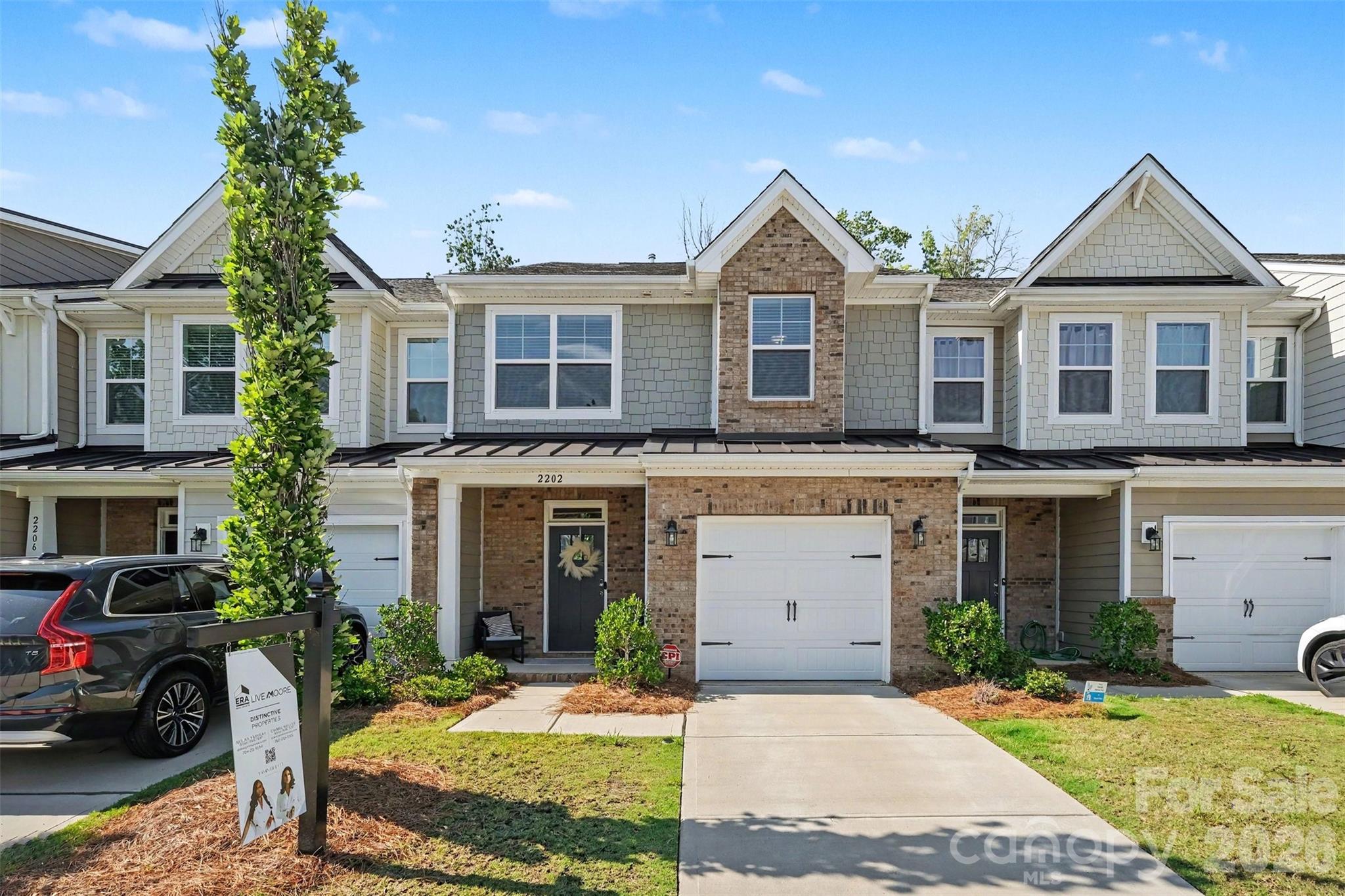 Ask About 1% RATE REDUCTION SELLER IS PROVIDING FOR THE FIRST YEAR !!!!Welcome to 2202 Bextar Trail, a stunning brand-new townhome in the heart of Matthews offering the perfect combination of style, comfort, and convenience. Featuring the highly sought-after Ashland floor plan, this beautifully designed home offers 3 bedrooms, 2.5 bathrooms, and over 1,800 square feet of thoughtfully crafted living space.From the moment you enter, you'll be greeted by an elegant foyer with a tray ceiling and a spacious open-concept layout ideal for modern living. The gourmet kitchen features stone-gray cabinetry with crown molding, granite countertops, a white ceramic tile backsplash in a classic brick pattern, stainless steel appliances, and a gas range perfect for entertaining or everyday enjoyment. Durable Enhanced Vinyl Plank flooring flows throughout the main living areas, adding both beauty and functionality.Upgraded features throughout the home include craftsman-style interior trim, a charming beadboard drop zone, oak-tread stairs, and a luxurious primary suite complete with a double-bowl vanity, a soaking tub with a tile surround, and a walk-in shower with a semi-frameless glass door. Plus, Smart Home technology is included, offering convenience and peace of mind from day one.Located in a desirable Matthews community, residents enjoy easy access to shopping, dining, parks, and I-485, making commuting and daily errands effortless. New Weddington Road Exit, near publix and eateries with wonderful walkability!  Whether you're a first-time buyer, downsizing, or looking for low-maintenance living with upscale finishes, this home checks every box.Our 1% interest rate reduction that can help lower your monthly mortgage payment for the entire first year, making homeownership even more affordable. Schedule your tour today and discover why 2202 Bextar Trail is the perfect place to call home.