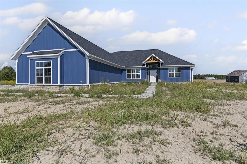 Exceptional New Construction Split Ranch on 5 Acres in China Township!! Discover your Dream Home with this New Construction Split Ranch, perfectly situated on 5 Acres in the serene China Township. This amazing property has everything your looking for and more! Spacious Bedrooms, Primary Bath features Double Sinks with Quartz Countertops, a rain shower head, 2 additional shower heads in a Stunning 6 x5 Tiled Shower complete with a built in bench for convenience, 13 x 9primary Walk-In Closet offers ample space for all of your belongings, Open Floor Plan- perfect for Living and Entertaining, Stylish Kitchen boasts beautiful LVP Floors, gorgeous white Lafata cabinetry, a Large Island in a rich Java color topped with Quartz Countertops, Look right into the Great Room which features a tiled floor to ceiling accent wall with an Electric Fireplace creating a cozy focal point, the mudroom includes a built-in bench with shelves, Relax and Unwind on your covered back deck for the Beautiful Days ahead, and a Full Basement offers endless possibilities, ready for you to make it your own! This gorgeous Split Ranch offers the perfect blend of luxury, functionality, and tranquility, all on a generous parcel of land. Don't miss out on this incredible opportunity!!