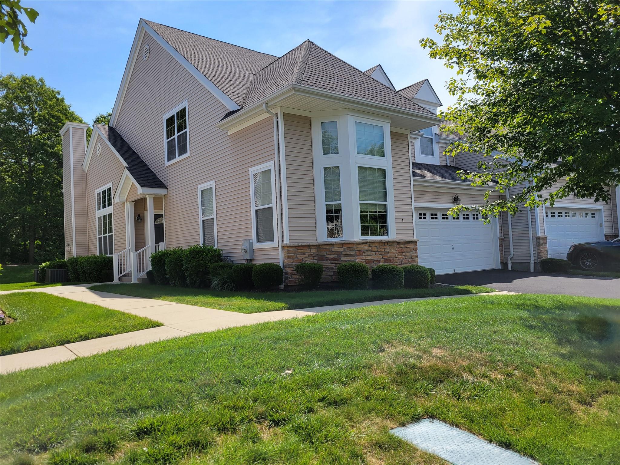 This beautiful 2 story home features an open floor plan on the first floor. The high ceilings and well appointed window placement gives a unique look to the space. The kitchen has a great work area. The primary bedroom with two large walk-in closets and primary bath are also located on the first floor. Up on the 2nd level is a second bedroom, full bath and loft area.  There is also an unfinished room which can be finished into an addidtional bedroom or office area. The basement is insulated, with high ceilings. The 2-car garage has an entry into the home through the laundray area. This is a gated Community, has a pool which is heated, and a Club House with a well equipt workout area, tennis court and pickleball court. A Must See...
