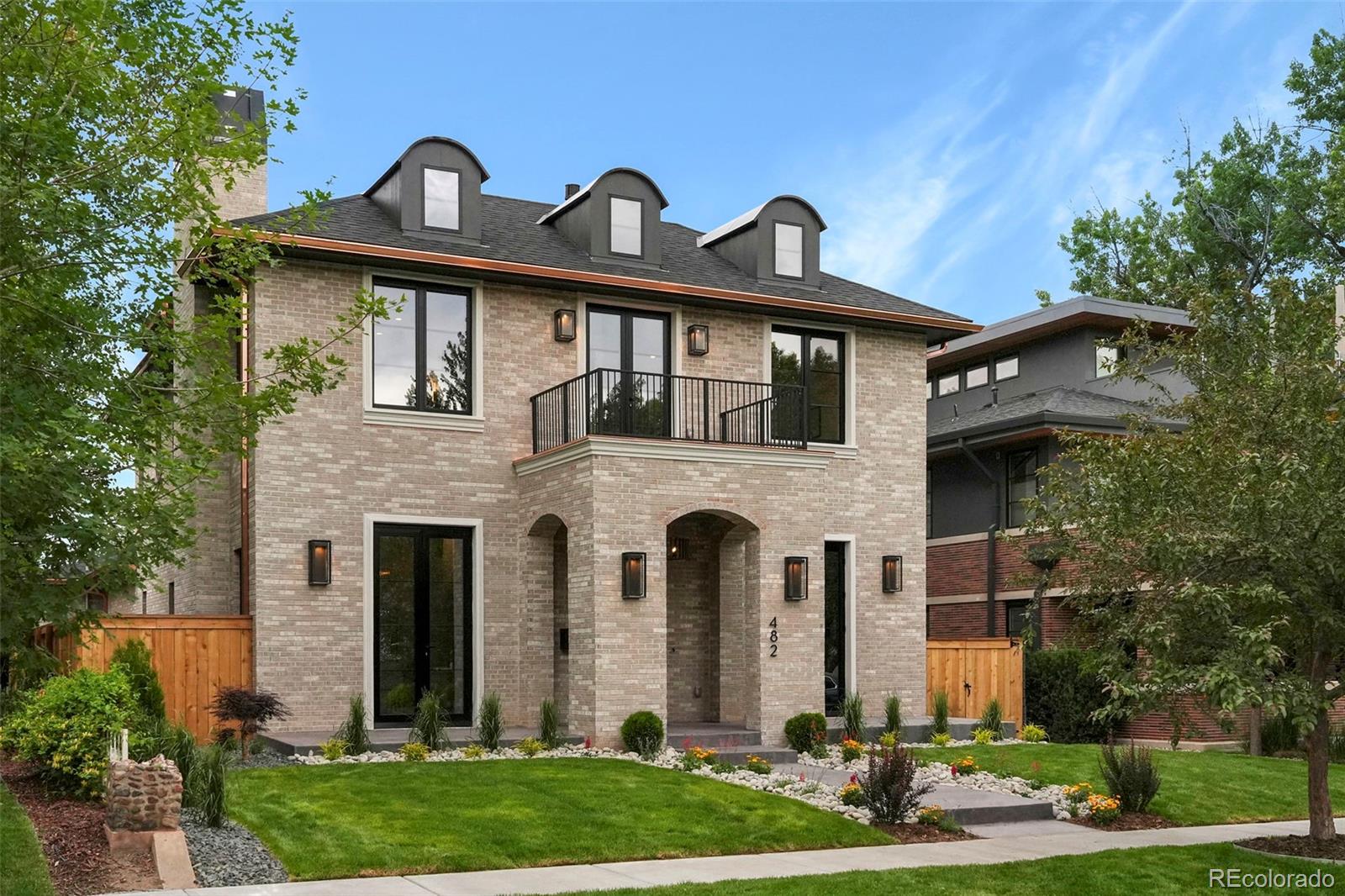 Prime Washington Park location literally just steps from the park! 500 ft from the park, this all brick new construction home just completed June 2026 by Progressive Building Group (PBG) is the epitope of luxury living. Excellent floor plan with rare 11 foot ceilings on main level. Kitchen w/double wide fridge/freezer, Thermador wifi 48" gas range & dishwasher, & drawer style microwave. Waterfall island w/ double thick edges & bonus cabinetry on back side. Granite backsplash, $1300 Brizo pot filler, $1200 Brizo faucets, Blanco sinks & more. Large walk in pantry + butler area w/fluted marble backsplash & lighted open shelves. Large living room with accordion patio door & gas fireplace. Main floor home office. Formal dining room w/gas fireplace, granite surround & custom mantel. Mud room w/dog wash. Primary bedroom w/walk out balcony, dual walk-in closets, & primary bath w/fluted soaker tub & heated tile floors. Laundry room with double (2) sets of stackable front loading washers/dryers. Finished basement w/wine display, rec room w/gas fireplace & wet bar, 3/4 bath, large bedroom, & huge home gym or 5th bedroom. Triple pane windows imported from Europe (unique to PBG homes, w/180 degree rotating handles offering various operation methods - open as normal or open top portion/reverse awning-style). Designer ($$$) lighting & plumbing fixtures throughout. 2 car attached insulated & garage w/polyaspartic floor coating (stronger than epoxy), hot + cold water/hose spigot, & EV wiring in place. 4 fireplaces. Exterior w/stamped concrete patios w/gas line for fire pit + BBQ. Luxurious copper gutters which will patina/change color & add character over time. Tankless water heater. Tons of energy efficiency upgrades: Zip System insulated sheathing behind brick, triple pane windows, spray foam attic insulation, premium Energy Recovery Ventilator (ERV) airflow ventilation system & more. 2 year builder warranty included + structural warranty. Buyer to verify taxes (not yet assessed).