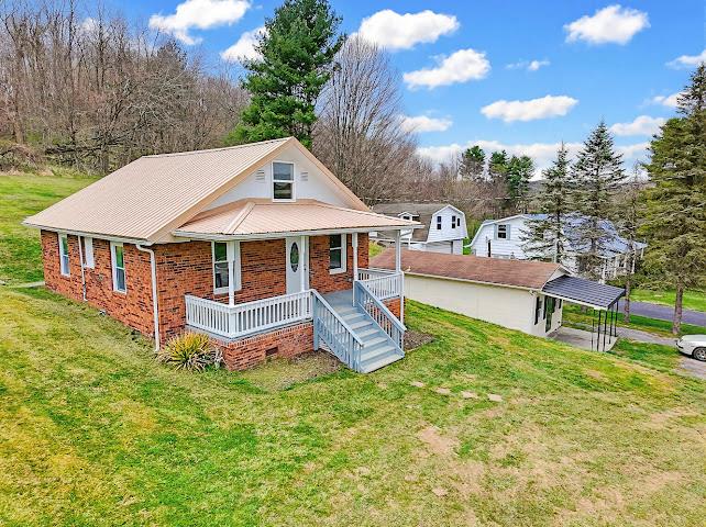 Attention investors! Check out this renovated two-bedroom brick home with a loft that can serve as a third bedroom. Conveniently located just minutes from schools and Main St, it also includes a second renovated one-bedroom, one-bath home currently rented for $600 a month. Don't miss this opportunity—call today for a tour.