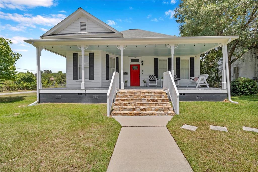 Two Homes in One! Stunning Historic District Renovation in Thomasville, GA. Experience timeless charm and modern comfort in this beautifully renovated turn-of-the-century home located in the heart of Thomasville's Historic District. This flexible property offers two living spaces in one—use as a 4-bedroom, 3-bath home or take advantage of the separate 2-bedroom, 1-bath ensuite for guests, in-laws, or rental income. Inside, you'll find refinished original pine floors, soaring ceilings, decorative fireplaces, and abundant storage throughout. The spacious chef's kitchen is the centerpiece of the home, featuring granite countertops, cabinet-accent lighting, new stainless steel appliances, and plenty of space for entertaining. Each living area offers a private entrance, separate utility meter, and its own relaxing porch—perfect for an Airbnb, VRBO, or multi-generational setup. Extensive updates include new electrical and plumbing systems, gutters, HVAC, and stylish modern finishes that complement the home's historic character. A detached garage with a Tesla charger adds a touch of luxury and convenience. Located just a few blocks from downtown Thomasville, enjoy easy access to top-rated restaurants, charming boutiques, and cultural attractions—all just a short stroll or golf cart ride away. Don't miss this rare opportunity to own a fully updated historic property with income potential and unmatched location! Call today for your private tour.