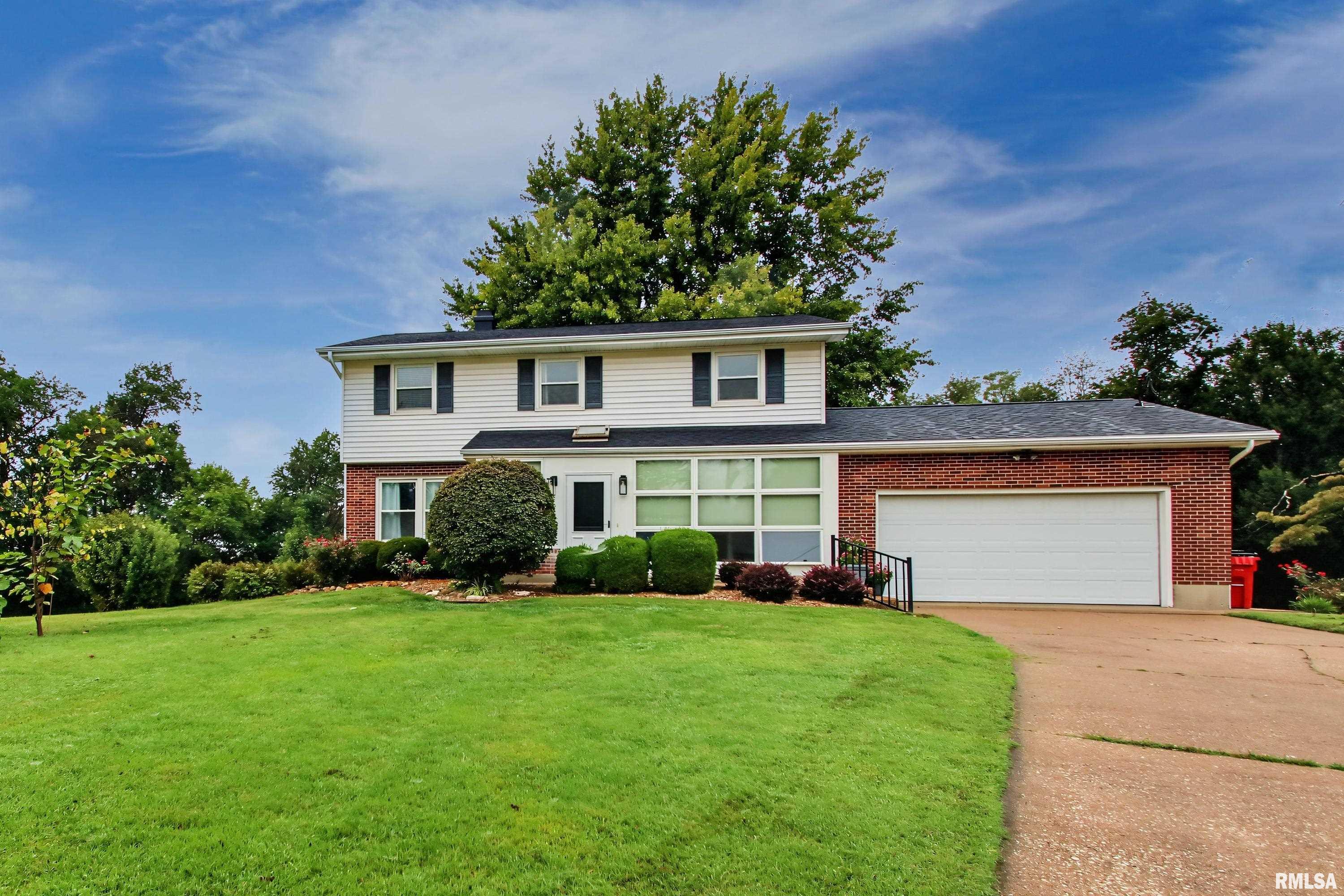 Space, updates and a setting you'll love close to Quincy.  This 4 bedroom, 2 1/2 bath home sits on a generous 1.44 m/l acre lot on a country cul-de-sac offering plenty of room to enjoy both indoors and out.  The inviting front porch welcomes you home, while the back porch/mudroom and deck provide great spots for relaxing, entertaining, or simply enjoying the peaceful surroundings. Inside, you'll find plenty of room to spread out with a living room, family room, spacious kitchen, and formal dining room, giving everyone a space to gather, relax or unwind.  The partially finished walk-out basement adds even more flexibility and potential for additional living and recreational space.  2 gas fireplaces in the family room and rec room are perfect for those cool nights. The home has been updated and offers some major recent improvements, including a new roof and furnace in 2026.  Newer flooring and most windows replaced with vinyl replacements are a couple more key features.  With 4 bedrooms, multiple living spaces, acreage, and a cul-de-sac location, this home offers the combination of comfort, space, and convenience to Quincy.