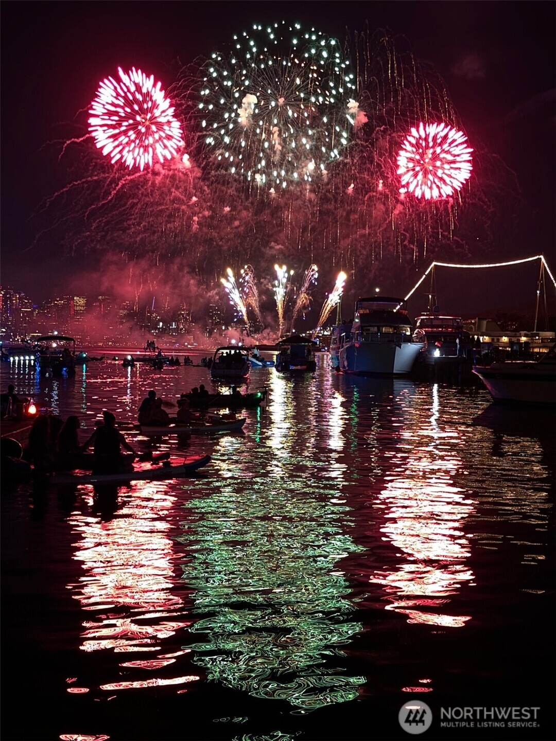 Fireworks Sale!  Price drop just in time to get you in by the 4th of July. This houseboat is one of Seattle best kept secrets with fireworks displays, Christmas ships and seaplanes off your deck! The houseboat is located in the coveted end-slot position, which allows unrestricted views of both Lake Union and the city skyline. Step inside the houseboat to find the perfect space for lively gatherings and tranquil solo time alike: There’s a wide interior, a thoughtfully equipped kitchen, and impressively vaulted ceilings throughout. A barn door leads to a three-quarter bathroom, and the expansive living room offers easy deck access through radiant stained glass doors. Upstairs, find a welcoming bedroom with high ceilings, marina views, and a large closet. This houseboat’s perfect location goes deeper than its gobsmacking views. With Marina parking passes included, you’re just minutes from all this area has to offer and all of its richest attractions: Gasworks Brewery, the scenic Burke Gilman Trail, the University of Washington and its vibrant surrounding neighborhood, and more. Plus, lake-centric recreation is yours for the enjoyment, with kayaking, paddleboarding, and even hot tub boating less than a stone’s throw away. Do Seattle living the right way— summer or any season— aboard this sensational houseboat.