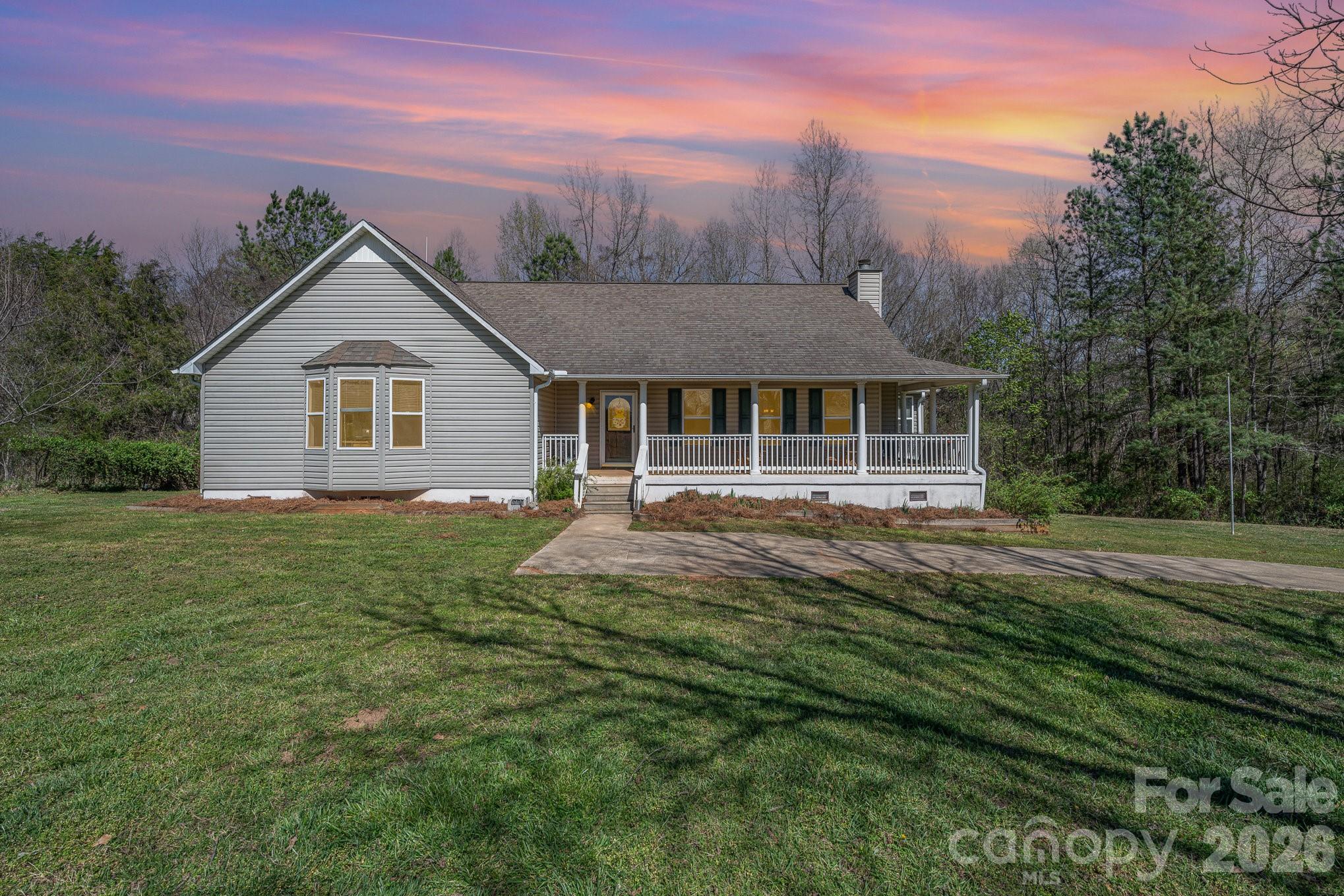 One story farm house on 74.39 acres. The 3 bedroom 2 bath home has a large living room, sunroom, and a kitchen with lots of counter space and an island. Large front porch overlooking the pasture, which currently has sheep. There is a 60’x23’ building that has power and water. There is another small storage building that goes with the home. The land is amazing. Large hardwoods, two creeks and a pond! Great for hunting, hiking, or future homesites. This farm is close to I-26. Only 23 miles to Spartanburg and 45miles to Greenville.
