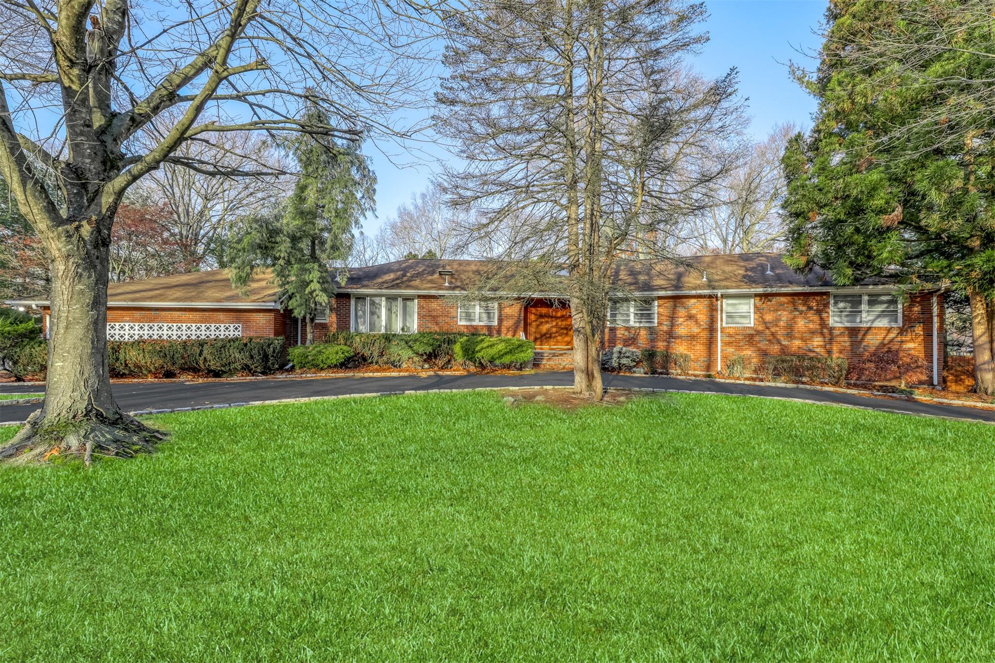 This sprawling about 5000 SqFt ranch in Chestnut Ridge presents a wealth of potential, featuring 6 bedrooms and 5 bathrooms across two levels. The home includes two kitchens—one on the main floor and another in the fully finished walk-out basement—providing excellent flexibility for living and entertaining. Outside, you'll find a private, fenced backyard with a welcoming in-ground pool, ideal for outdoor enjoyment. 
With its expansive layout and prime location, this property offers a fantastic opportunity for the right buyer.
