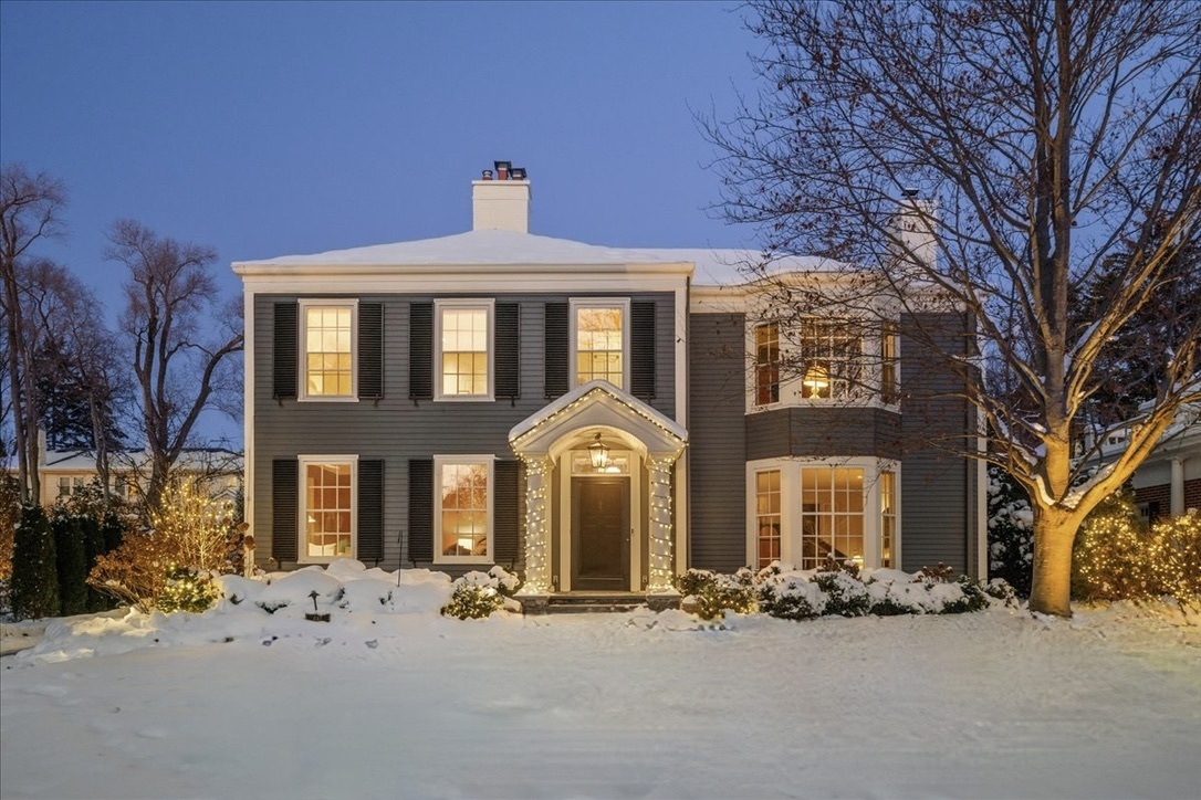 Sophisticated colonial on an extra wide lot (72 ft. wide) on coveted Walden Road in one of Winnetka's most desirable neighborhoods: close to both downtowns, schools, parks, The Grand, both Winnetka and Hubbard Woods Trains. This 5 bedroom 4.1 bath meticulously maintained home seamlessly blends carefully curated comfort with modern refinement while highlighting classic vintage details throughout with a rare ATTACHED garage! Truly expansive foyer leads to elegant and inviting sun-filled living spaces with lofty ceilings and a great floor plan. The spacious living room, with its handsome fireplace, provides a wonderful serene space for daily living: whether entertaining and quiet contemplation. The designer gourmet kitchen thoughtfully planned & organized is centered by a spacious island with seating, and features high-quality Birdseye maple cabinetry, new quartz countertops, high-end appliances, including two dishwashers, ample storage, and a delightful breakfast area. Adjacent is a large sunny family room. An elegant dining room with heated floors and a convenient wet bar opens to the beautiful large bluestone patio and private backyard with several seating areas for lounging, dining, and gathering plus a fire pit area: great for outdoor entertaining. Upstairs the rare 5 generous bedrooms on the second floor provide space for everybody. The primary with a raised tray ceiling, ambient lighting, and private bath, is a quiet oasis. Two additional bedrooms share a renovated bath and the third has an ensuite bath. A private 5th bedroom with bath and a separate staircase is a great flex space for an office or a private guest suite. A convenient upstairs laundry room completes the 2nd floor. The lower level features a huge finished rec room with a gas log fireplace and ample storage. With an attached heated 2+ car garage and bonus room for extra storage or gardening enthusiasts, plus a beautifully landscaped private yard, this fabulous home offers an exceptional lifestyle in a sought-after location.