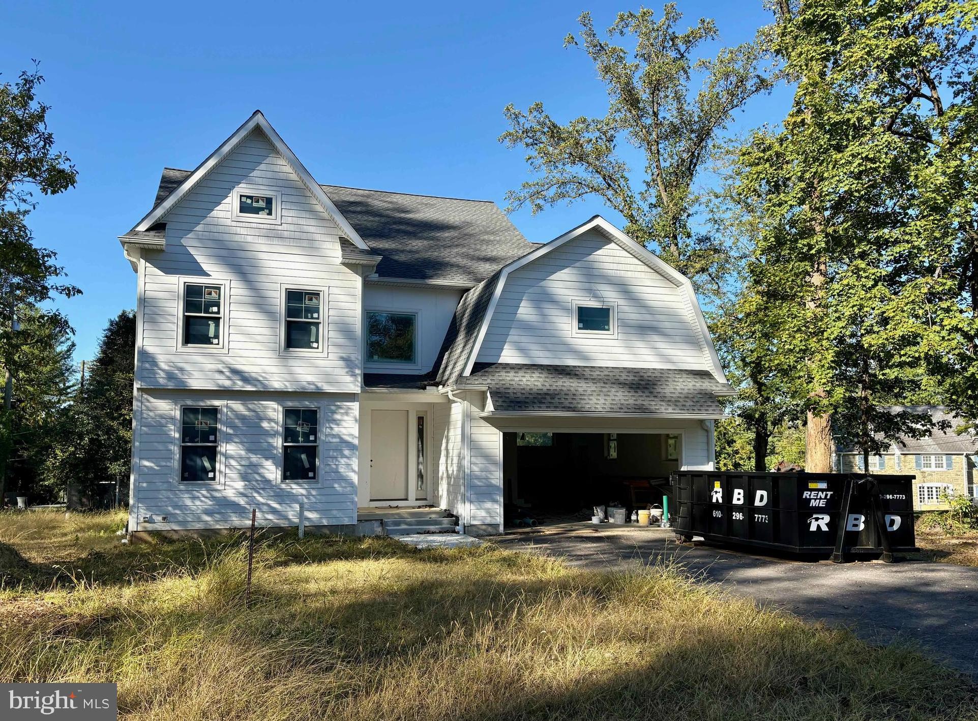 Welcome to 101 Highfield Road!  This luxury new construction home is nearing completion and will be ready for delivery this fall.  Highlights include 4,912 square feet of above grade living space, five bedrooms, five full and two half bathrooms, a finished basement with multiple egress windows, two-car front entry garage, massive composite deck with stairs to grade, and a level half acre lot in the heart of Villanova.  Main level highlights include 9’ ceiling height, family room with custom built-ins and exposed beams, large dining room with triple window and custom moldings, gourmet kitchen with custom cabinetry and large island, adjacent sundrenched morning room with French door to rear deck, mudroom with closet and cubbies, powder room, dry bar with cabinetry, and pantry.  The second floor is home to a stunning primary bedroom suite with tray ceiling, huge walk-in closet, linen closet, and a spa like bathroom with stall shower, free standing tub, two vanities, and a private water closet.  Three secondary bedrooms with en-suite bathrooms and walk-in-closets and a conveniently located laundry room complete this level.  The third level include the fifth bedroom with ensuite bathroom and walk-in-closet, access to additional storage, and a finished retreat area perfect for a multitude of uses.  The lower level has 1,100 sq ft of additional living space and offers a large recreation area, half bathroom, another finished space that could be used as a guest or in-law suite, dressing room, and a 3-piece rough-in for future full bathroom or laundry.  Other highlights include ample recessed lighting throughout, red oak site finished hardwood floors throughout main level and second floor hallway, oak stairs, premium plumbing fixtures, Anderson windows, stormwater system engineered for future pool or additional impervious coverage, privacy fencing, and professional landscaping.  This incredible property is located minutes from Lancaster Avenue and the Blue Route, regional rail lines, all major commuter routes, shopping, dining, multiple country clubs, parks, and private schools, and is part of the top-rated Radnor School District.