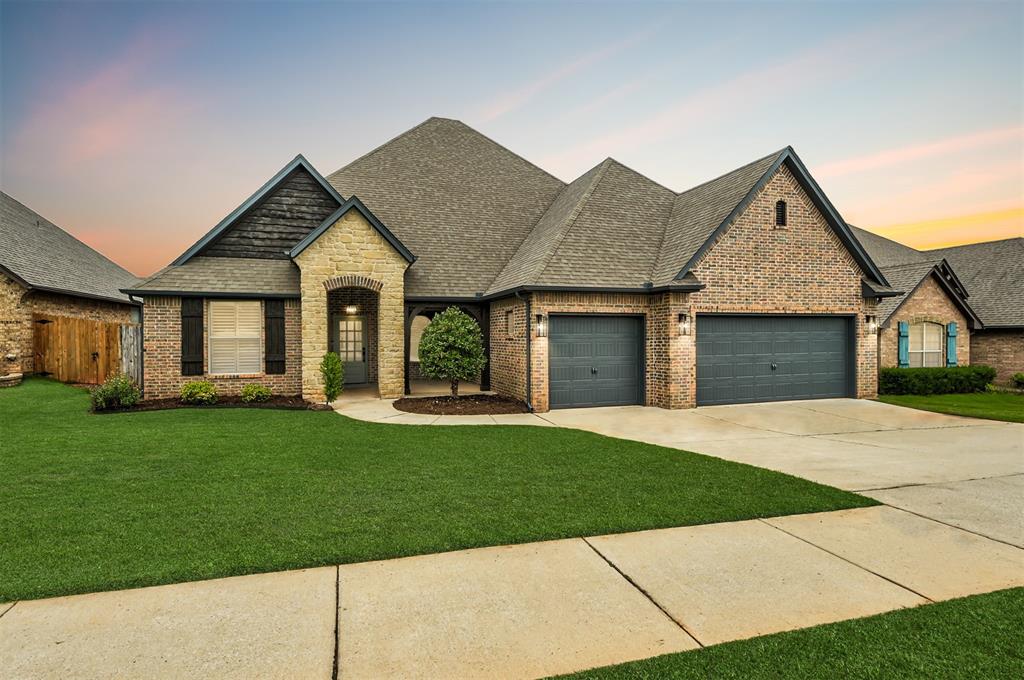 Let us open the door to your next chapter at 1108 Samantha Lane. Timeless elegance meets modern convenience in this beautifully crafted home in the highly sought-after Rock Creek community. From the moment you walk in, you’re welcomed by an open, light-filled floor plan designed for both comfort and style. The expansive Great Room features soaring ceilings, oversized picture windows, and a sleek modern fireplace that anchors the space with warmth and sophistication. The chef-inspired kitchen is a dream, offering a large center island with counter seating, designer tile backsplash, newer appliances including gas cook top, spacious pantry, and effortless flow into the inviting dining area—perfect for hosting or everyday living. This home offers three bedrooms, three full baths, a powder bath, and an upstairs bonus room with the option for a fourth bedroom with a private ensuite—ideal for guests or multi-generational living. The primary suite is a private retreat with wood flooring, and complete with a spa-like bath featuring separate vanities, a corner jetted soaking tub, walk-in shower, and a spacious, beautifully organized closet. Every detail has been carefully curated, from the stylish wood flooring in the main living areas to the premium designer finishes throughout. A thoughtfully designed mudroom with built-in storage, sprinkler system, and sink in the utility room,  energy-efficient features enhance the home’s function and appeal. Located in the award-winning Moore School District, this home also comes with access to Rock Creek’s community pool, playground, and basketball court—offering a vibrant, active lifestyle just minutes from Tinker AFB, shopping, and dining. Start your new story today at 1108 Samantha Lane. We’re ready when you are—schedule your private tour and come see what makes this home so special. Welcome home.