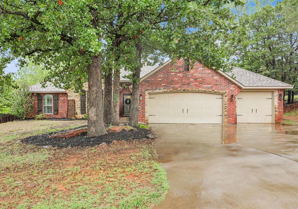 Welcome to The Rock Dove Retreat, a warm, move-in ready home in Edmond’s Avian Woods community, set on a fenced .65-acre lot with room for the whole family to spread out. With a brand new roof (July 2025) and a new air conditioner (January 2025), the big-ticket items are already done for you.Inside, the open layout puts the kitchen at the heart of the home. Granite countertops, a high-top bar for quick breakfasts, a large dining area, and a pantry with its own lighting make everyday meals and holiday gatherings easy. The living room features a wood-burning fireplace, perfect for cozy winter evenings.The split floorplan gives the primary suite its own private retreat, complete with a dual vanity, a separate shower and soaking tub, a private water closet, and a large walk-in closet. A flexible office, study, or playroom gives you space to work from home or let the kids play. The laundry room is a standout, with a second pantry space, hanging racks for finished laundry, and added shelves.Out back, the covered patio with a ceiling fan overlooks a fenced yard shaded by large mature trees, great for summer cookouts and playtime. The 3-car attached garage has a door that runs straight through to the backyard, handy for toys, tools, or a workshop, and a storm shelter in the garage floor adds peace of mind.Avian Woods residents enjoy a kids’ park, basketball court, merry-go-round, and picnic tables for easy family fun just steps from home. HOA is only $330 per year. Guthrie schools. All financing types welcome, including USDA.Come see why this one feels like home!