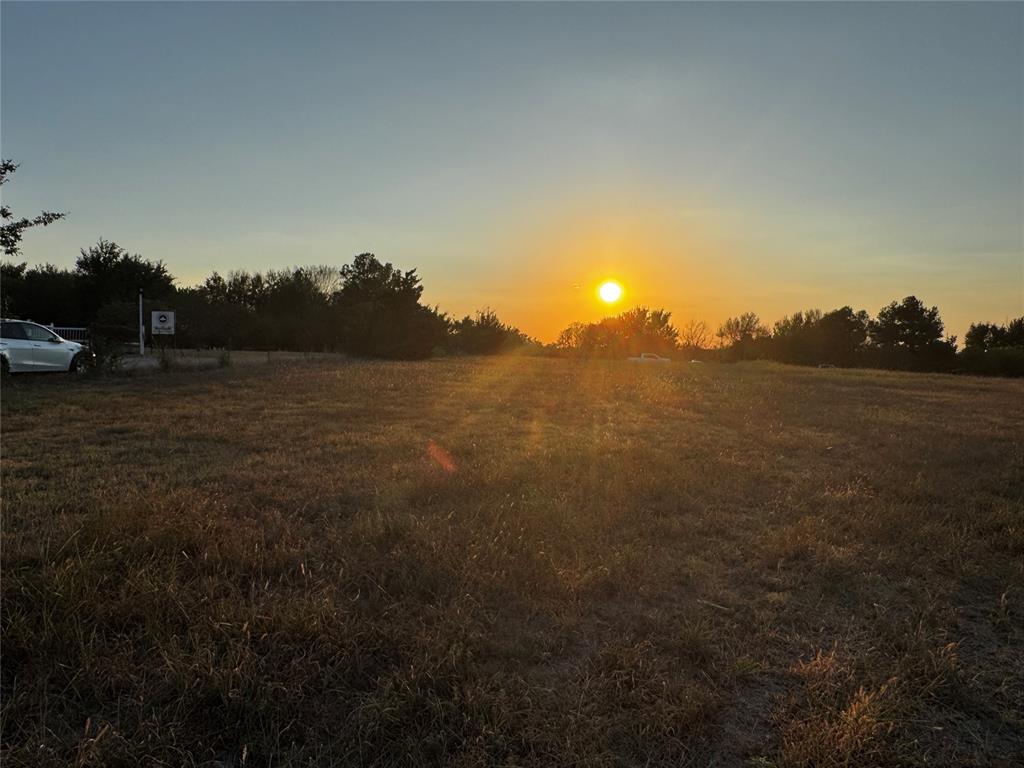 Rare opportunity to own approximately 2 acres in a convenient Deer Creek Schools area location with, just over a block from US 74/Portland Avenue. This level, mostly flat property offers approximately 195 feet of road frontage and plenty of space to build your dream home. The property includes an existing well that is currently not in use. Water service is available through Deer Creek Water Authority, and electric service is provided by OG&E. No HOA—enjoy the freedom to design and build with no HOA restrictions.