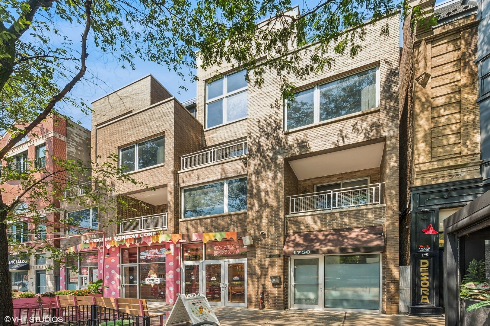 Step directly into an urban sophistication with this approximately 1750 square feet, extra-wide, and expansive 2-bedroom, 2.5 bath oasis in the ABSOLUTE HEART of Wicker Park! Boasting private two-car garage parking and two spacious outdoor terraces overlooking vibrant Division Street, this home combines refined design with unbeatable city energy. Enjoy a private elevator entry into a bright, open-concept living space, perfect for entertaining or relaxing. The oversized chef's kitchen is outfitted with an oversized island, stainless steel appliances, including a brand new oven, and striking designer lighting. The expansive living area includes a designated dining area and a flex space perfect for a home office or play area. The massive primary suite is a true retreat, featuring a den which can be enjoyed as a lounge area or office, a large organized walk-in closet, and a luxurious en-suite bath with a stone steam shower. The second bedroom also includes a private en-suite bathroom, ideal for guests. With summer in full swing, enjoy morning coffee or evening cocktails from either of your two balconies, taking in the buzz of one of the most prime stretches of the best restaurants, bars, boutiques, and cafes. Just steps to The Perch, Smoke Daddy, Kasama, Tortellos, Parlor, Starbucks, Collectivo, Mama Delia, the Blue Line, and quick highway access, this location simply can not be beat. Urban elegance, private convenience, and modern comfort-this is Wicker Park living at its finest.
