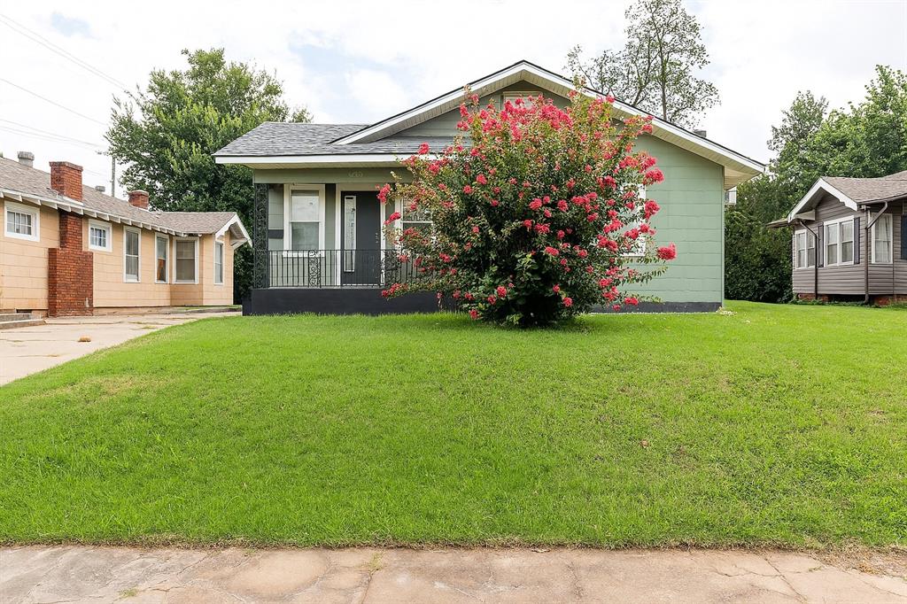 Fantastic opportunity in the highly sought-after Military Park neighborhood of Oklahoma City! This charming 1,650 sq ft bungalow features 3 bedrooms, 1.5 bathrooms in the main house, plus a fully converted 460 sq ft detached studio apartment with a private entrance—ideal for long-term or short-term rental income. Whether you choose to live in the main house & rent out the studio, or lease both for maximum investment potential, this property offers flexibility & financial opportunity. You'll love the classic curb appeal with a welcoming front porch, & step inside to find a light-filled home with large windows, refinished hardwood floors & original Craftsman details including built-in shelving & a beautiful fireplace. The home has been thoughtfully updated with all new electrical, recessed lighting, modern light fixtures & energy-efficient windows. The interior showcases 5-panel doors, custom hardware & beautiful finishes throughout. The spacious living room flows seamlessly into the dining area & a large, fully renovated kitchen featuring 3 cm quartz stone countertops, stainless steel appliances, a chef’s overhead vent, under-mount sink, wine cooler, bar area & durable porcelain tile flooring. The full bathroom has been fully remodeled with a luxurious shower panel system, floor-to-ceiling tile with a built-in shampoo niche & brand-new vanities and toilets. All three bedrooms are generously sized with neutral finishes & ceiling fans, & the layout offers a great balance of open flow & private space. Additional updates include fresh paint throughout the main living areas & a new plumbing line from the city main. Out back, the detached studio apartment is perfectly equipped with a mini kitchen, full bathroom & open living/bedroom layout—ideal for guests, short-term stays, or consistent rental income. Conveniently located near major amenities, shopping, dining, & highways, this property blends historic charm with modern flare & income-producing potential. Welcome Home!