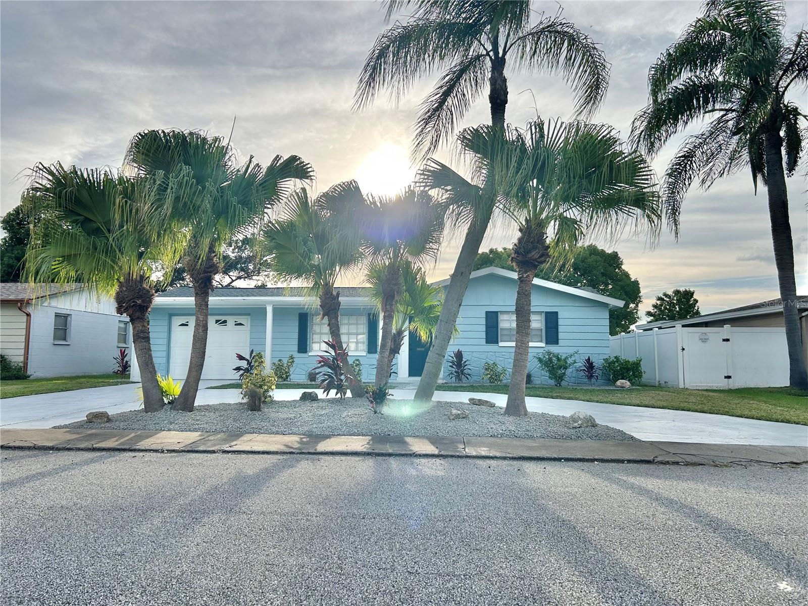 BEAUTIFUL 3/2 POOL home . Relax and enjoy the sunset from your backyard pool oasis that is on a freshwater canal. Enjoy fishing off your own dock in the backyard. The large pool has been freshly resurfaced to last for many more years. Enjoy the chefs kitchen that includes white shaker cabinets, premium Quartz counter tops, stainless steel appliances, breakfast bar, led recessed lights, crown molding, and tile backsplash. The two bathrooms have been updated with marble vanity tops, new vanities, and porcelain tile. New ceiling fans & light fixtures thru-out. Natural wood luxury vinyl plank flooring throughout the entire living space. New Window Treatments, New 5 1/2" Baseboards, freshly painted interior and exterior. Brand new ac and pool pump. New landscaping in front with beautiful palm trees. Minutes to gulf beaches, the Anclote fishing pier and historic Tarpon Springs. Tampa airport and the Suncoast Parkway are a short drive from this home, also. Very centrally located. DON’T MISS OUT ON THIS POOL HOME. IT WILL NOT LAST LONG.