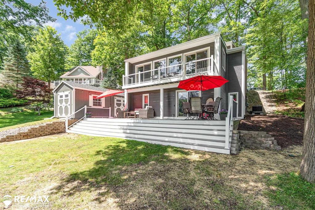 Dollhouse gem. Waterfront living on Lake Lacer in Sugar Springs. Discover comfort, style, and serenity at 4826 Lancelot Ct, a beautifully updated 3,000 sq ft lakefront home in the heart of Gladwin's Sugar Springs community. This spacious 3 bedroom(plus a potential 4th), 2.5 bath home blends modern upgrades with stunning natural surroundings, ideal for year-round living or a luxurious weekend getaway.  Inside, the centerpiece of the main living space is a striking 360-degree fireplace, creating a warm and inviting atmosphere from every angle. The wall of windows and a door wall bring in natural light and panoramic views of Lake Lancer, from inside or outside on your private terrace, the perfect spot for morning coffee or evening sunsets. Enjoy direct lake access from the walkout with a beautiful deck, with room to entertain.  So many new updates you will want to check it out for yourself. So come check it out and see what sugar springs has to offer from the private beaches, a championship 18 hole golf course, tennis & pickleball courts, indoor pool, fitness center, clubhouse, and so much more. This is the ideal combination of modern comfort and up north charm, ready for you to move in and enjoy.  https://sugarsprings.net/