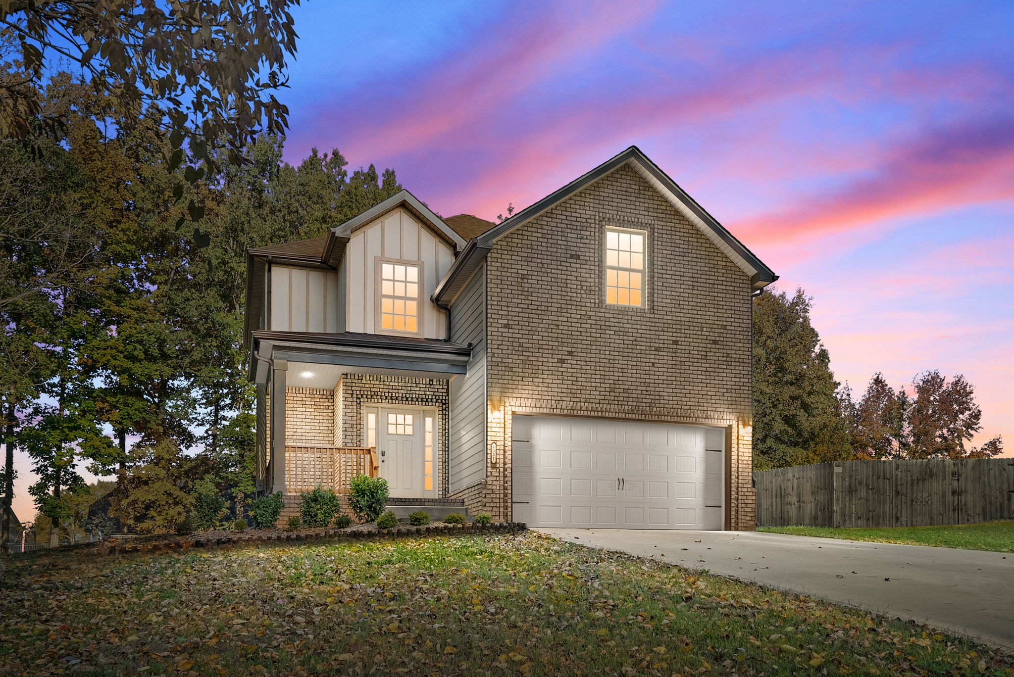 Beautiful Home on Over Half an Acre – County Taxes Only!Welcome to this stunning 4-bedroom home perfectly situated on a large, level lot surrounded by mature trees—offering peace, privacy, and convenience. Enjoy county taxes only while being just 45 minutes to Nashville and only about 30 minutes to Fort Campbell!Open-concept layout featuring luxury vinyl plank floors, a shiplap fireplace centerpiece, and an abundance of natural light. The kitchen is a true showstopper with granite countertops, stainless steel appliances, tile backsplash, a pantry, and soft-close cabinets and drawers.Upstairs, you’ll find four bedrooms and a massive master suite with a double trey ceiling, large walk-in closet, and a luxurious bath boasting double vanities, a walk-in tile shower, garden tub with tile surround, and tile floors throughout all wet areas. The large laundry room is conveniently located upstairs for easy access.Need extra space? The fourth bedroom over the garage is perfect for a media room, playroom, or home office.Outside, the long driveway sets the home back from the road and leads to a two-car garage. Enjoy relaxing on the covered front porch or entertaining in the large level backyard complete with a covered back patio and a new wood storage shed.Located in the Carmel Elementary, Rossview Middle, and Rossview High school zones, this home offers the perfect balance of quiet country charm and city convenience.