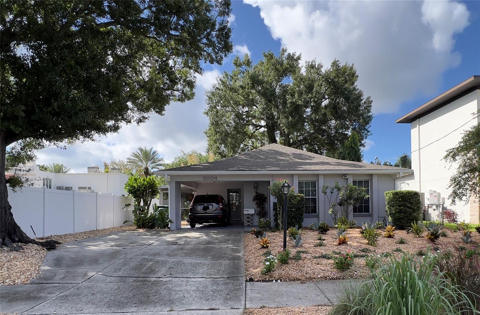 Sweet Home, Great Schools and Living in South Tampa 33629 at an Affordable Price! Move-in-Ready, Block Construction, 3-bedroom, 2-bath, 1-Car Carport under New Roof, Gutters and New Exterior Paint 2025, New Front Landscaping and Irrigation System 2026, New A/C 2022, New Refrigerator 2023. Other Maintenance, Repipe Hot and Cold Water Lines to All Fixtures 2011, House Electric Upgraded 2008, Water Heater 2015, Washer & Dryer 2018, and AC Ductwork 2015. Nice Floor-plan with Florida Room and Screened-In Porch, Inside Laundry Room, Cozy Bright Kitchen with Vintage Lighting, Dining Room leads into Large Living Room. Large Primary Bedroom with Private Bathroom, and Two Secondary Rooms with Closets, the Smallest Used as an Office. Room in the backyard for a Shed, Play Area, Pets or a Pool. Convenient to Downtown, McDill AFB, Sports Venues, International Airport and International Mall.