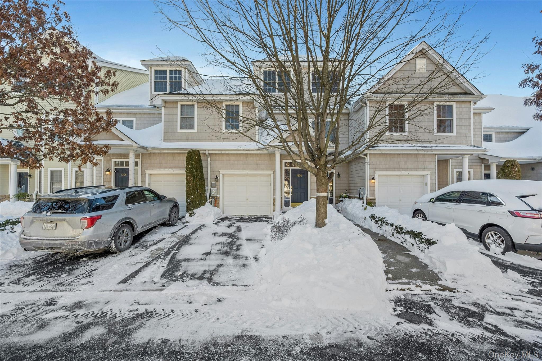 Welcome to this rare resort-style living opportunity: a 3-bedroom, 3.5-bath townhouse located in the sought-after community of Half Moon Bay. Known as the hidden jewel of Croton-on-Hudson, the community offers exceptional amenities, including a complimentary jitney to the train station (5 minutes), tennis courts, exercise room, bike paths, a playground, approximately 3 miles of shoreline promenade, two heated pools, and two clubhouses.This spacious, light-filled townhome features:First Floor: Entry foyer with closet and direct access to the garage.Second Floor (Main Level): Open kitchen with stainless steel appliances, a spacious dining area, oversized living room with a dual-sided fireplace, sliding doors to a private deck, laundry room, powder room, and a bedroom with a full bath.Third Floor: A generous primary bedroom suite with sitting area, walk-in closet, and en-suite bath, additional storage space, and a third bedroom with a full bath. A perfect blend of comfort, convenience, and resort-style amenities. Taxes do not reflect STAR reduction of $1274.