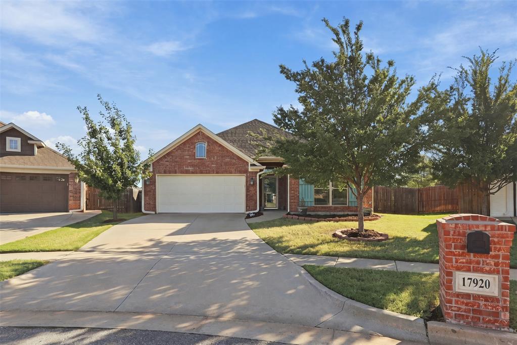 Welcome home to this 8-year-old beauty tucked inside a small, gated section of Edmond’s Valencia neighborhood. Convenience meets resort-style living here: the community pool, clubhouse, and fitness facility are right at your doorstep, and yard maintenance is taken care of for you. Inside, the kitchen offers abundant cabinet space, and the dining area is anchored by a one-of-a-kind copper light fixture that makes a true statement over the table. The primary suite is a private retreat with a large walk-in closet and a walk-in tub for easy, spa-style soaking. One of the secondary bedrooms, with hardwood floors and a sunny front-yard window, is ready to be your home office, guest room, or hobby space.Out back, a gardener’s dream awaits. The previous owner put real love into this yard, with multiple flower beds framed in stone landscaping blocks, ready for you to keep blooming or make your own.Quiet, gated, and loaded with amenities. Come see how easy life can be in Valencia.