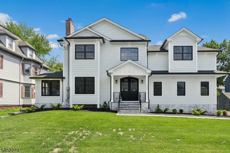 Welcome to this exceptional custom home, completely renovated from top to bottom with outstanding craftsmanship, luxurious finishes, and thoughtful design throughout. Offering over 4,000 square feet of beautifully finished living space, this stunning residence features 5 spacious bedrooms, 5 full bathrooms, and a powder room, providing the perfect balance of elegance and functionality.The dramatic two-story family room is flooded with natural light through premium Andersen 400 Series windows, creating an impressive yet inviting gathering space. Designed for today's lifestyle, the home also boasts a fully finished basement with a full bathroom, ideal for a recreation room, home gym, guest suite, or media room. Built with quality in mind, the exterior showcases durable Hardie Plank siding, a three-car garage, an oversized driveway, and a generous 0.34-acre professionally landscaped property. Perfectly situated in one of Cranford's most desirable neighborhoods, you'll enjoy convenient access to the vibrant downtown filled with exceptional restaurants, caf s, boutique shopping, parks, and year-round community events. Commuters will appreciate the nearby NJ Transit train station offering direct service to New York City, while top-rated schools and easy access to major highways make this location second to none.This is a rare opportunity to own a truly move-in-ready luxury home where timeless design, exceptional quality, and an unbeatable location!