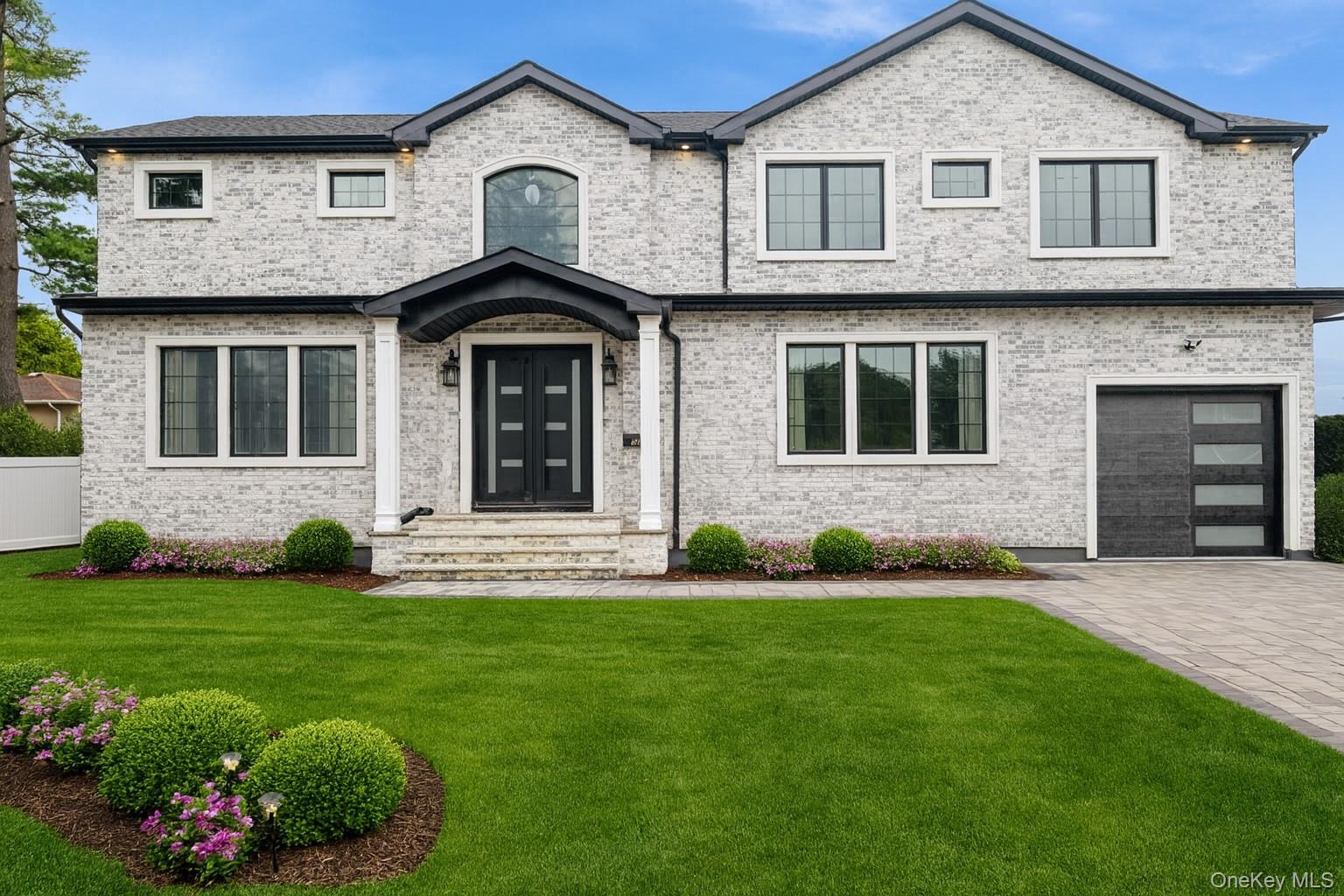 PLEASE NOTE: Images are from a previously completed residence by the same builder on the adjoining lot. This home is currently under construction and will be built to match the model. Estimated completion is approximately Spring 2026.Experience refined luxury in this brand-new modern Colonial, ideally located in the heart of Hicksville. This thoughtfully designed home features a grand open-concept layout with sun-filled interiors, soaring ceilings, and elegant finishes throughout. The gourmet chef’s kitchen seamlessly flows into the living and dining areas, ideal for everyday living and entertaining.Offering a first-floor bedroom with full bath, a luxurious primary suite with spa-like bath, and additional well-proportioned bedrooms, this home is designed for comfort and functionality. The full basement with outside entrance and the fenced backyard with in-ground sprinklers complete the property. An exceptional opportunity for extended family or multi-generational living, with an additional newly constructed residence available on the adjoining lot. There is still time to personalize select finishes. A rare opportunity to own new construction in one of Hicksville’s most desirable neighborhoods.