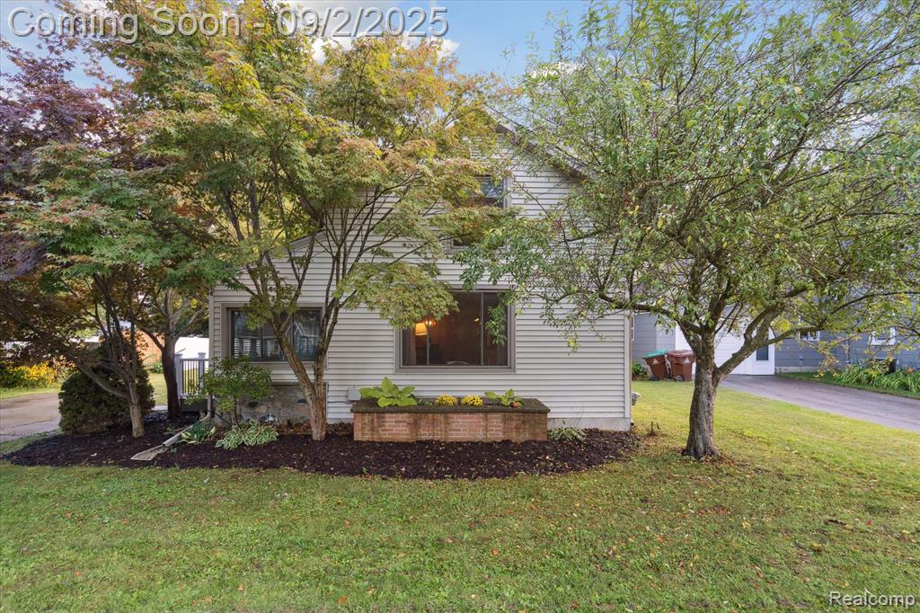 Charming Historic Home in the Heart of Downtown Williamston! Step inside this beautifully maintained historic home just steps away from all the shops, dining, and charm that downtown Williamston has to offer. The inviting front entryway, complete with built-in storage cubbies, sets the tone for the thoughtful updates and timeless character found throughout. The main level features freshly painted walls, newer light fixtures, and hardwood floors hidden beneath the carpet, ready to be revealed and restored to their original beauty. The updated kitchen boasts modern finishes and a clean, functional layout, while the updated bathroom adds style and comfort. A versatile non-conforming third room offers endless possibilities — create a home office, a guest bedroom, or a flexible space to suit your needs. Step outside to your own private backyard with mature trees that create a serene, shaded retreat. A large deck provides the perfect spot for morning coffee, evening barbecues, or entertaining friends and family. The heated, insulated garage/workshop with a new garage door is ideal for hobbies, projects, or extra storage. Historic charm, modern updates, and an unbeatable location — this home has it all.