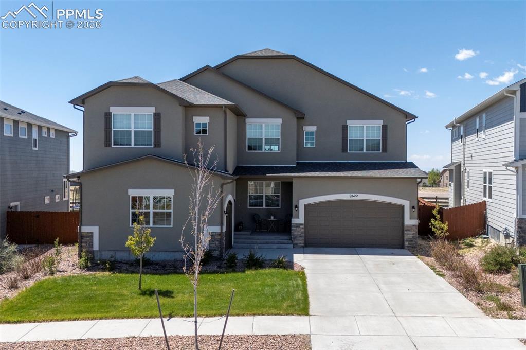 Welcome to luxury living in the highly sought-after Meridian Ranch community of Peyton, Colorado—offering nearly 6,000 square feet of refined living space, breathtaking Pikes Peak views, and backs to open space and Antler Creek Golf Course.  Designed for both everyday comfort and elevated entertaining, this expansive home features 4 bedrooms each with it's own bathroom, thoughtfully arranged to provide privacy, flexibility, and functional luxury throughout. The main level showcases an open-concept layout anchored by a chef’s gourmet kitchen complete with premium stainless appliances, a large center island, abundant cabinetry, walk-in pantry, and seamless flow into the dining and living areas.  A formal dining room, private office, and inviting great room with fireplace add elegance and versatility to the main floor. Large windows throughout capture natural light and showcase sweeping views of the surrounding open space and mountains.Upstairs, the primary suite is a true retreat—featuring a spacious sitting area, dual-sided fireplace, spa-inspired bathroom with soaking tub, oversized walk-in shower, dual vanities, and expansive walk-in closet(s). A dedicated laundry connection adds everyday convenience. Additional upper-level bedrooms each include en-suite bathrooms and walk-in closets, along with a spacious loft providing extra living space.The fully finished basement expands the home’s versatility with a large recreation area, media/theater space, additional bedroom(s), full bathroom, and ample storage—ideal for guests, multigenerational living, or flexible lifestyle needs.  Outdoor living is equally impressive, featuring a covered patio and beautifully maintained backyard designed for low-maintenance enjoyment with turf landscaping and unobstructed views of Pikes Peak and open space.  A 3-car garage provides generous space for vehicles, storage, or hobbies.Located in Meridian Ranch, residents enjoy access to premier community amenities including a recreation center with indoor and outdoor pools, fitness facilities, sports courts, parks, and miles of trails. Conveniently situated near shopping, dining, golf, and military installations, this home offers the perfect balance of luxury, lifestyle, and location.This is Colorado living at its finest—where luxury design, breathtaking scenery, and everyday convenience come together seamlessly.