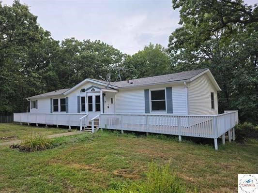 This well maintained ranch home won't last long! The home features an updated open eat in kitchen with a fireplace! All newer appliances stay. The 3 bedrooms and main level are a plus! Outside you will find a carport with concrete floored shop/garage. All of this on a nice lot! Nestled with trees, what a great feel! You better call on this right away!