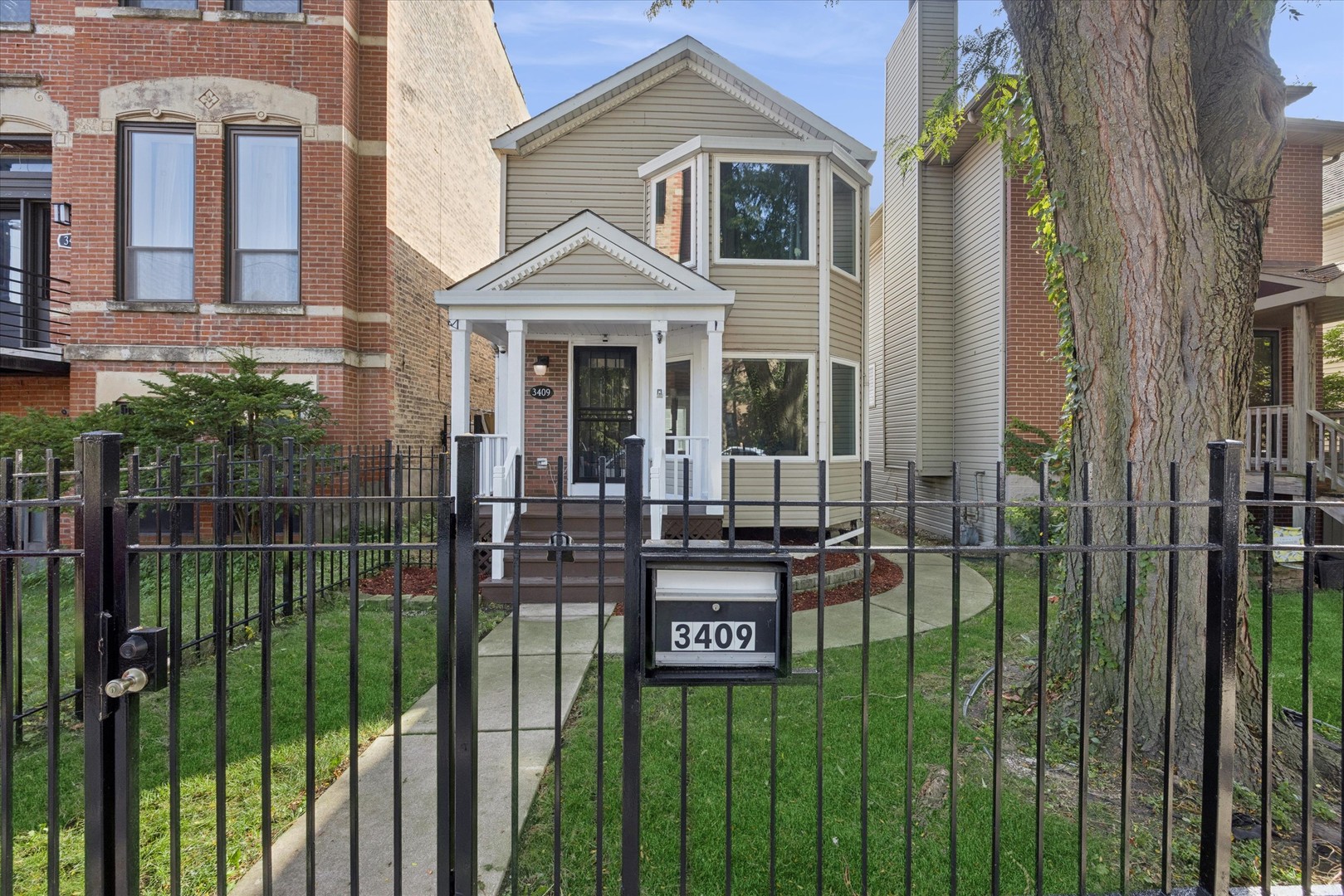 Awesome Single Family Home with Huge Privacy Fenced Yard and oversize 2.5 car Garage! This Beautiful 3 bedroom 2 full bath home in a beautiful tree lined street. This cute well kept home features Hardwood Floors throughout with new carpeted bedrooms. Full bath on 1st and 2nd floor. Huge Master bedroom...New casement windows and picture windows on 1st and 2nd floor, Updated appliances, HVAC and Hot water tank. Huge deck off back of the home and an awesome yard. Best deal in the Gap/Bronzeville Neighborhood's. Plus extra storage in the basement. So much packed into this cute home...Make it yours today! Easy access to downtown by bus, "L", or Metra and just steps away from 2 college campus's IIT and ICO. plus White Sox Park (Rate Field), walk to a game or hop the bus out front to work it's all about convenience! Shops, Restaurants,Starbucks all close by...