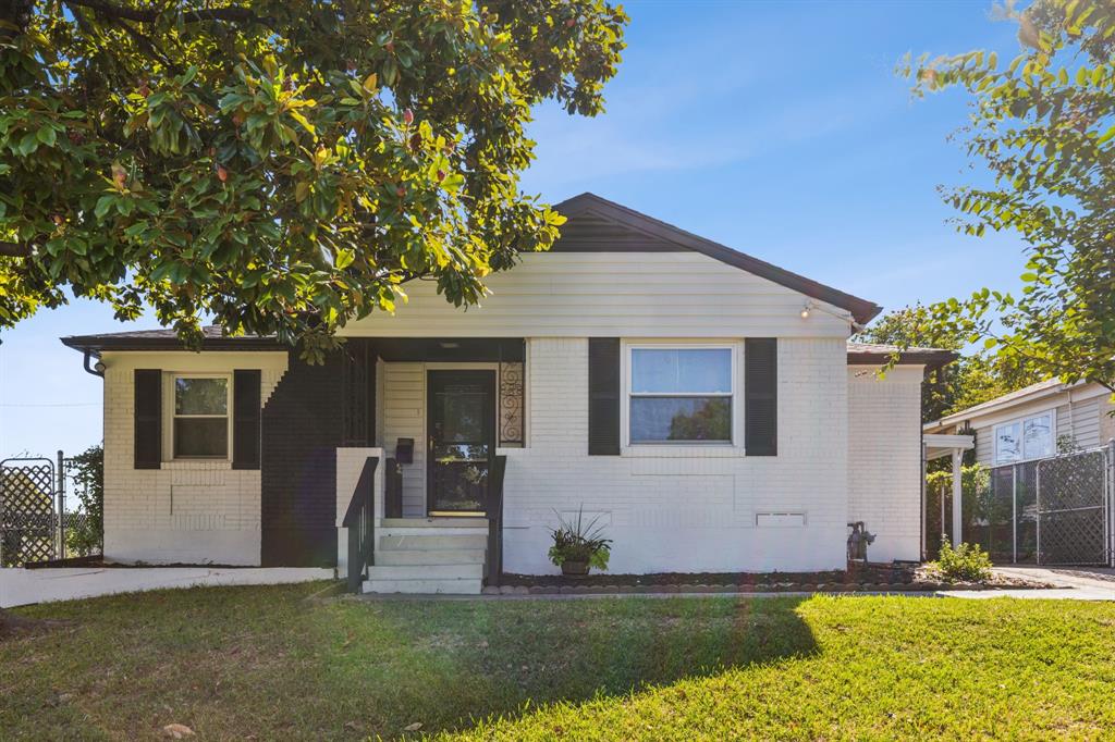 View of front of house with a front lawn
