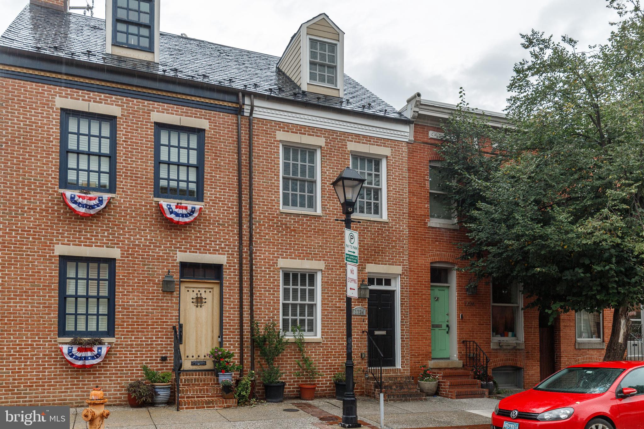 Charming 3-Bedroom, 3-Bathroom home with attached garage parking and private rooftop terrace.Welcome to Fleet and Regester Streets, a 3-bedroom, 3 full-bathroom home, ideally set up for roommates, located in the heart of Fells Point! 1 block to Broadway Market, 2 blocks from weekly farmers market, bars/restaurants galore and a 15-minute walk to Johns Hopkins hospital, enjoy all that Fells Point has to offer.Home has an updated kitchen (all stainless steel plus a dishwasher), rear porch, 2 HVAC zones, stacked washer/dryer, hardwood floors throughout, and great closet space.