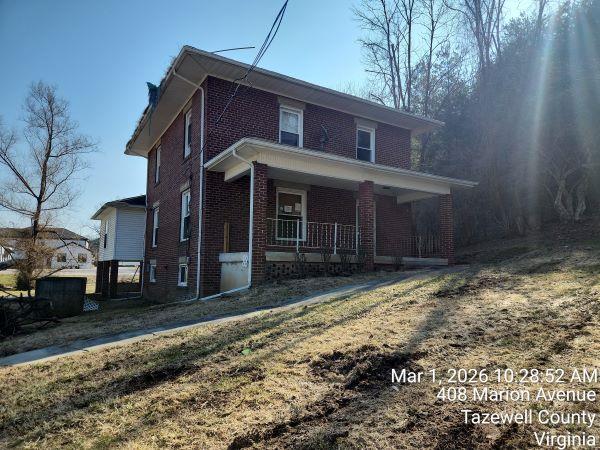 Attention Inventors!! This brick home is located near downtown Tazewell and US19. Subject is in need of repairs and maintenance including a new roof, electrical updates and mechanical. Four bedrooms and two full baths. Due to condition, the property may have health/safety risk(s). Prior to entry/access, all parties must sign a Hold Harmless Agreement, and the property may only be shown by appointment.