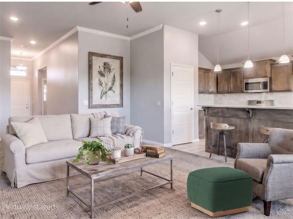 *New 2K credit toward flooring* This home is 6 years old. It has a fresh coat of paint and a new dishwasher. If you make an offer now you can move in time for all the Back to School activities at OU, Norman High, Irving, or Madison.  Or this could be your Game Day house because it's only 11 minutes South of the Stadium.  Sure you could build a brand new house with the neighborhood builder but that takes 7 months and this already has a fence and blinds and is waiting for you today. Also it did NOT lose power during the July 4th storm.
