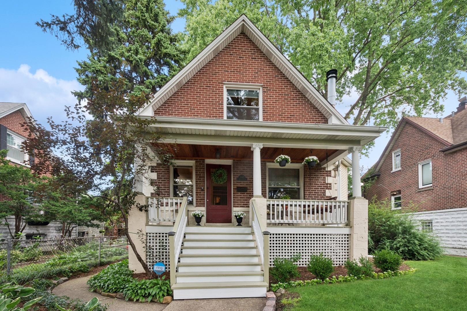 We are proud to present this absolutely charming city cottage ideally located in the heart of vibrant Old Irving Park! Built in 1905 and thoughtfully updated throughout the years, this home blends the best of its original details with all the comfort and modern amenities you're looking for. A gracious 21' front porch welcomes you to enjoy your afternoon lemonade on its antique swing. The first floor features a grand foyer with double glass doors which open to a generous living room, complete with a wood burning fireplace. A pretty and bright kitchen including a walk in pantry, leads to a lovely addition with skylights creating the perfect family room/ great room. Completing the first floor is a separate formal dining room and full bath with jacuzzi tub. The second floor features 3 nice sized, super cozy bedrooms and a gorgeously renovated bathroom with Carrara marble, heated floors and double vanities. Beautiful original oak floors run throughout the home with a lovely patina only attainable with time. This generous 50 x 150 foot lot affords an expanse of grounds you must see to believe. The backyard features a large 2 level deck with plenty of room for multiple seating areas, all ready for your entertaining and enjoyment. Custom exterior lighting, abundant perennial gardens and a separate 2 car garage wrap up this pretty package with a big beautiful bow. A walk out basement with laundry, half bath and a nice gym/work/play flexible space plus a huge storage room!  Steps to the Metra Grayland station, the blue line, 90/94. A quick jaunt to Jewel, Target and the new Northwestern Medical facility.