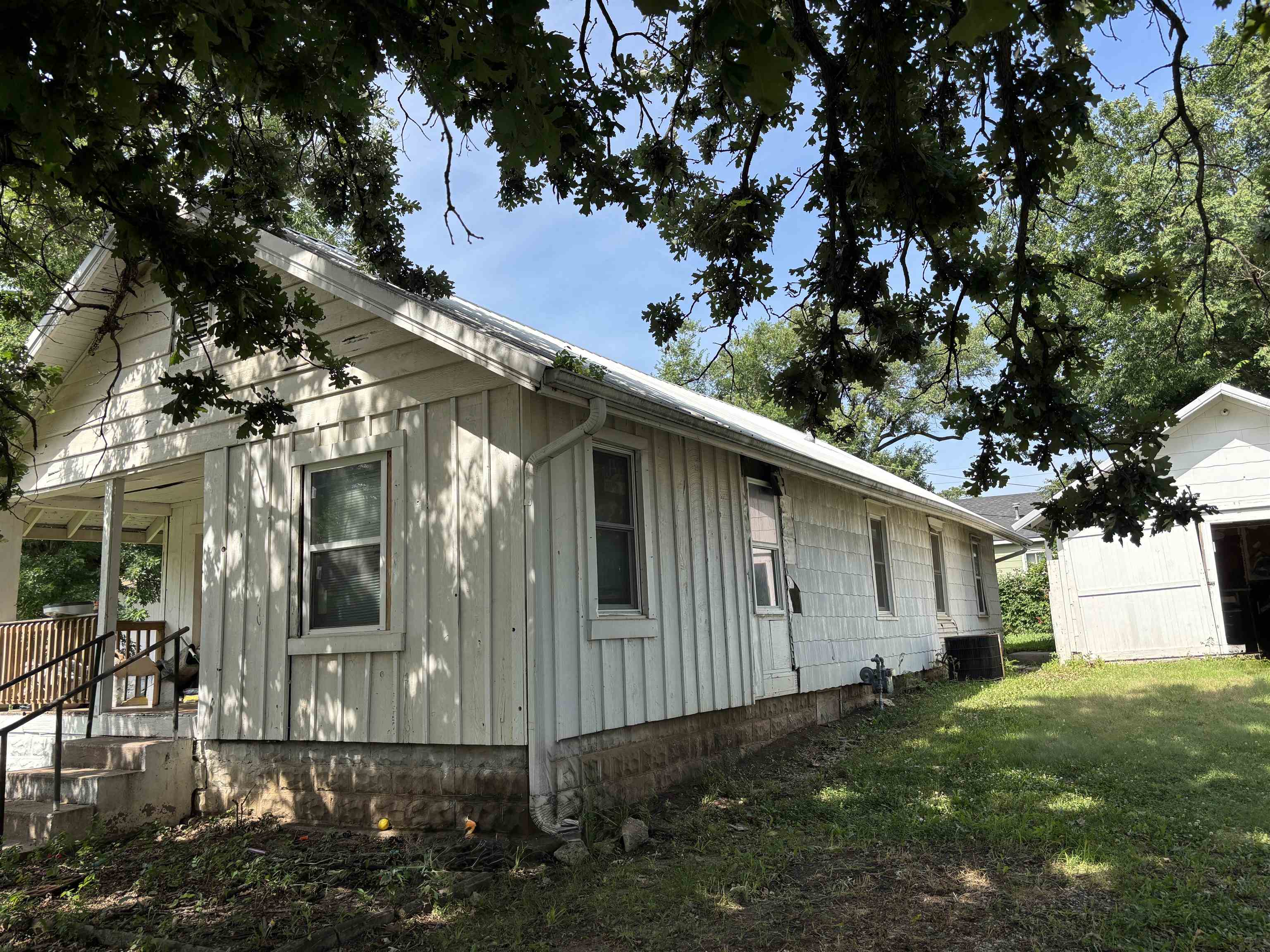 Calling all INVESTORS!!!!!!!Don't miss this opportunity brought to you by Faith Realty! This 3-bedroom, 1-bath home offers 1,177 sq. ft. of living space and sits on a corner lot. Features include a durable metal roof and a detached garage, providing extra storage and parking. Priced to sell, 10,000 below county tax value. This property is a great opportunity for investors or anyone looking to add their personal touch. Bring your offer! House is sold as is where is! Add to your rental portfolio - the sellers of this property also own the properties in El Dorado at 721 N. Star St. and 1029 N. Orient and would consider a package sale of these listed properties!