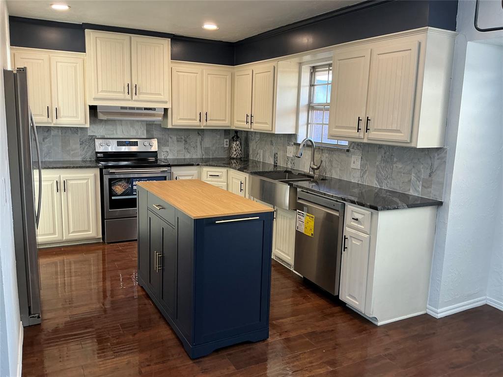 Step into a home where all the hard work has already been done for you. This home was appraised at $275,000 before the remodel.  This beautifully updated Northwest Oklahoma City residence blends contemporary style with a floor plan designed for effortless living. Located just one mile from NW Expressway, you’re minutes away from the city’s best dining, shopping, Putnam City North High School and commuting routes—yet tucked away in a peaceful neighborhood setting.Designed for Living & Entertaining with open concept into formal dining and 2 living rooms with laminate flooring.  Gather around the versatile wood-burning/gas fireplace in the main living area, perfect for Oklahoma winters and can hold a 86" TV on the wall.Chef-Ready Kitchen: Featuring stunning granite countertops, new  sophisticated marble backsplash, new high-end stainless steel appliances, new moveable island, plantation shutters and existing refrigerator is included. Open to formal and casual dining and 2 living rooms.3 spacious bedrooms with new carpet, 2 bathrooms with new tile, 2 closets in the hallway, there is plenty of room for a home office, playroom, or media center in the extra living spaces.  The primary suite is a true retreat, complete with a trendy barn door and custom shiplap details behind the bathroom mirror.The "big ticket" items are already handled: Brand New Roof (2023) & Hot Water Heater (2025); Fresh designer paint; plush new carpet throughout; Modern lighting; ceiling fans; and new cabinet hardware; Sleek porcelain 2'x3' tile in the entry along with the 2 entry closets; bathrooms floors and shower/tubThe front and backyard is an extension of the home, featuring storm doors, a covered patio; guttering; fully fenced yard with a sprinkler system, and storage shed. Safety and storage are top priorities here, with a garage storm shelter, insulated garage doors.  Plus, the washer and dryer stay!  Outdoor living on the front patio or covered backyard.