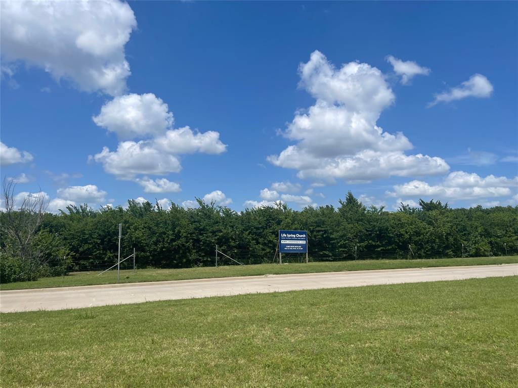 This property is located approximately 580 feet of frontage along the northeast side of John King, and approximately 355 feet off frontage along the north side of Life Spring Drive.  Life Spring Drive is a two-lane bi-directional, median divided, concrete paved, secondary neighborhood (Breezy Hill) street that is median divided by John King Blvd with two additional turning lanes.  This property is currently zoned commercial.  The property has access to all utilities.