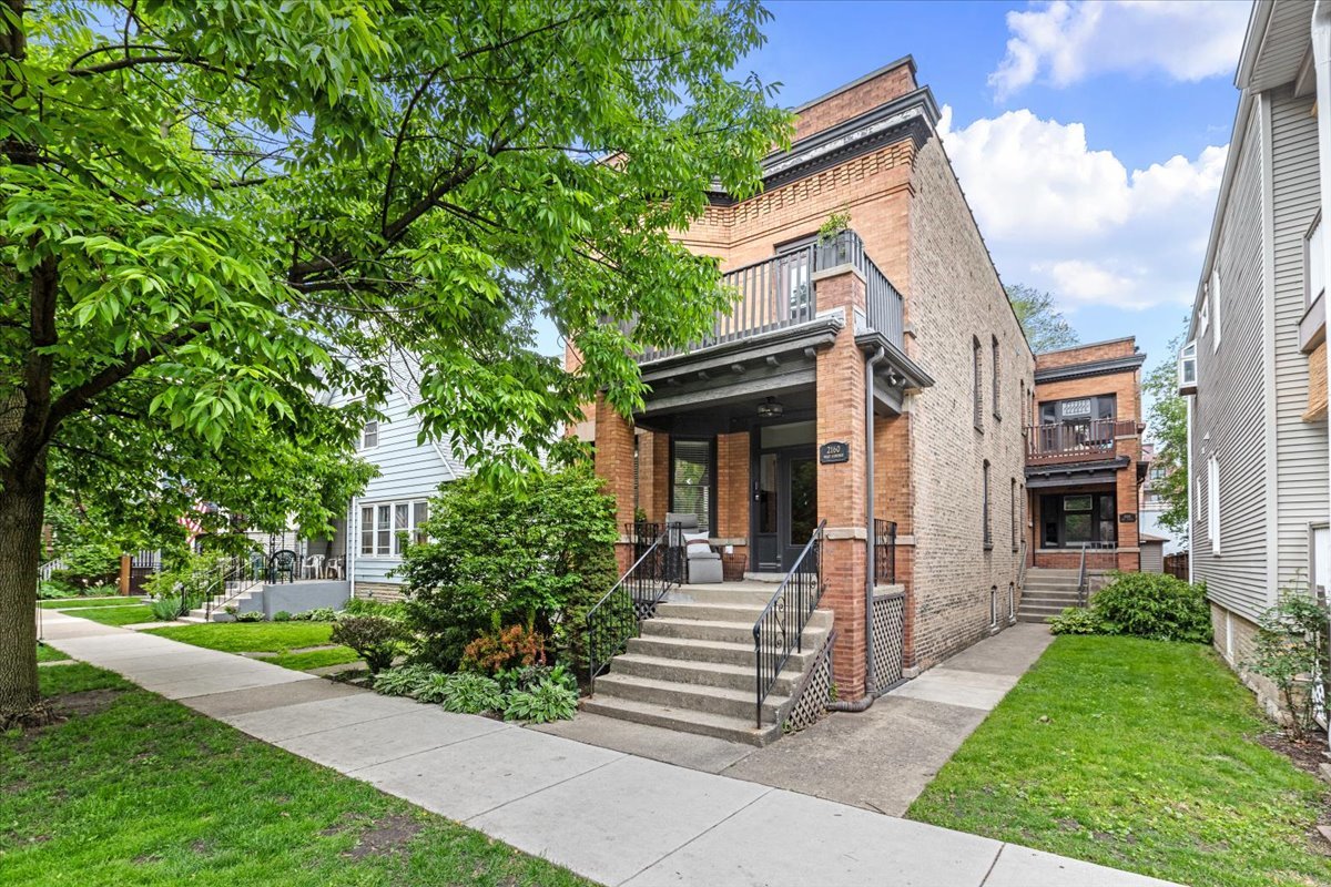 Your search is over! Exquisite, highly upgraded and just renovated 2 bed/1 bath condo, in intimate 4-unit all owner occupied solid brick building, on quiet tree-lined street in fantastic walk-to-everything location in the heart of Lincoln Square. Features great light, an open layout, a thoughtful floor plan and stunning high-end finishes throughout. Gracious foyer opens to large, sun-filled living room w/ south and east exposures and leaded glass window. Incredible, bright eat-in chef's kitchen offers granite countertops, maple cabinets and brand new high-end stainless steel appliances, and opens to big private deck ideal for family living and entertaining. Two large bedrooms including primary with walk-in closet. Designer marble bth with walk-in shower. Gorgeous, just refinished hardwood floors. New solid core doors. Custom moldings, paint and brand new designer lighting throughout. Central air/gas forced air heat. In-unit washer/dryer. Huge private storage room plus tons of additional storage. Low assessments and taxes. On-site parking included in price. Unbeatable location steps to restaurants, cafes, shopping, groceries, parks, Starbucks, the "L" and all that Lincoln Square has to offer.