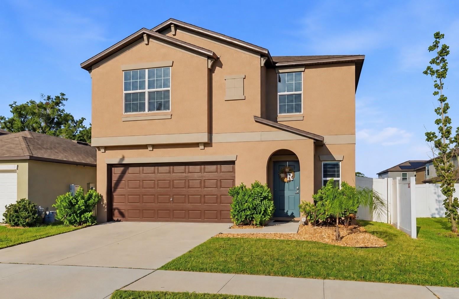 Exterior listing photograph: Five-Bedroom Home with a Loft in Riverview