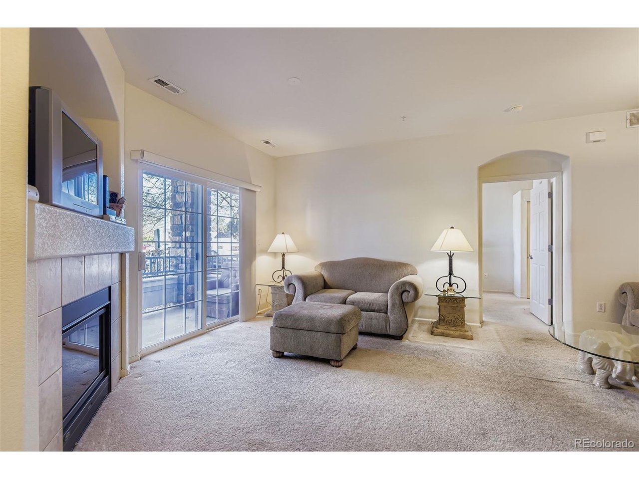 Welcome to 5255 Memphis St #3-307, a well-appointed first-floor condo offering comfort, convenience, and versatility in a desirable Denver location. This move-in ready 2-bedroom, 2-bath residence presents an excellent opportunity to create a home of your own or add a strong asset to your investment portfolio. Thoughtfully designed with a low-maintenance lifestyle in mind, the open-concept layout provides seamless flow between the living, dining, and kitchen areas, making everyday living and entertaining easy. The spacious living room is anchored by a cozy fireplace, creating a warm and inviting atmosphere year-round. Large windows allow natural light to fill the space, enhancing the bright and welcoming feel throughout. Both bedrooms are generously sized, offering flexibility for guests, a home office, or roommates. The primary suite is a private retreat, complete with a full en-suite bath and a walk-in closet for ample storage. Additional features include in-unit laundry, central air conditioning, and reserved parking for added convenience. Step outside and enjoy being just moments from nearby parks, a lake, a community pool, and a recreation center-ideal for an active lifestyle or relaxing weekends close to home. The first-floor location adds ease of access with no stairs, making daily living even more convenient. Perfectly situated with quick access to major highways, Denver International Airport, and the city's dining, shopping, and employment centers, this condo combines location, functionality, and value. Whether you're a first-time buyer, downsizer, or investor, this property delivers comfort, accessibility, and long-term potential in one complete package.