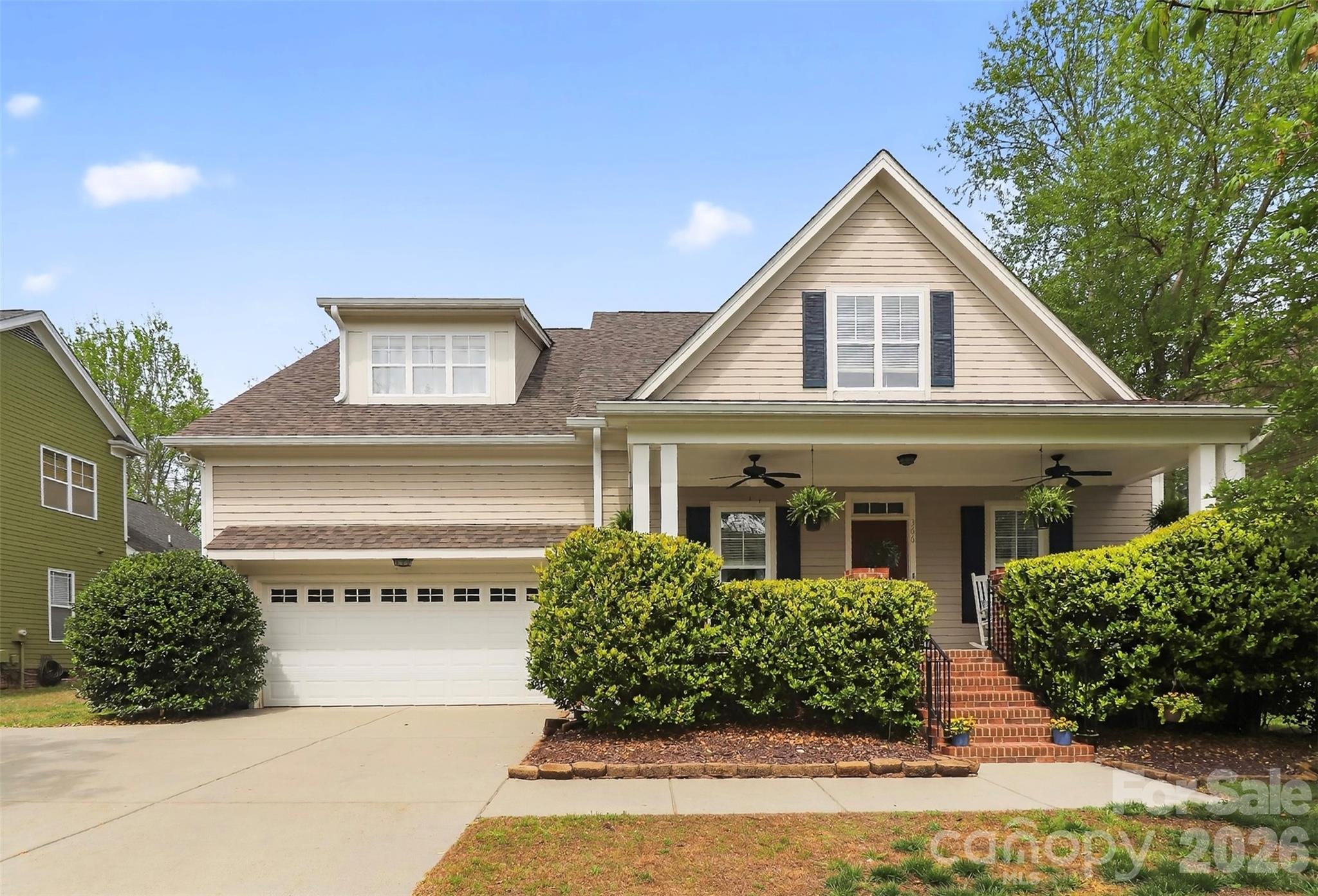 BIG-TICKET UPDATES ALREADY DONE! New roof and gutters (2023), two new HVAC systems (2025), full-home replumb, updated crawlspace with new vapor barrier and insulation (2023), refinished hardwood floors, fresh interior paint, and new carpet—offering true move-in-ready peace of mind.Rarely found in Tega Cay, this versatile floor plan features TWO primary suites on the main level, each with a private bath and walk-in closet, making it ideal for multi-generational living, guests, or aging-in-place convenience.The updated kitchen is equipped with granite countertops, tile backsplash, newer stainless steel appliances, breakfast bar seating, and glass-front cabinetry. Extensive moldings, detailed trim work, and rich hardwood flooring create warmth and character throughout.The spacious primary retreat features a tray ceiling and spa-like bath with a whirlpool tub and raised dual vanity. Upstairs, a large loft offers flexible space for a media room, office, or playroom, along with an additional ensuite bedroom, another secondary bedroom, and a full bath. Plenty of storage includes walk-in attic access.Step outside to a fully fenced, tree-lined backyard with a spacious deck—perfect for entertaining, relaxing, or enjoying the privacy of your outdoor space.Located in the heart of Tega Cay, one of the Carolinas' most sought-after lakefront golf course communities, residents enjoy golf, boating, trails, parks, recreation, and a strong sense of community. Flexible living spaces, major system updates, and an unbeatable lifestyle make this home a standout opportunity. Easy access to Charlotte, Fort Mill, Rock Hill and I-77.