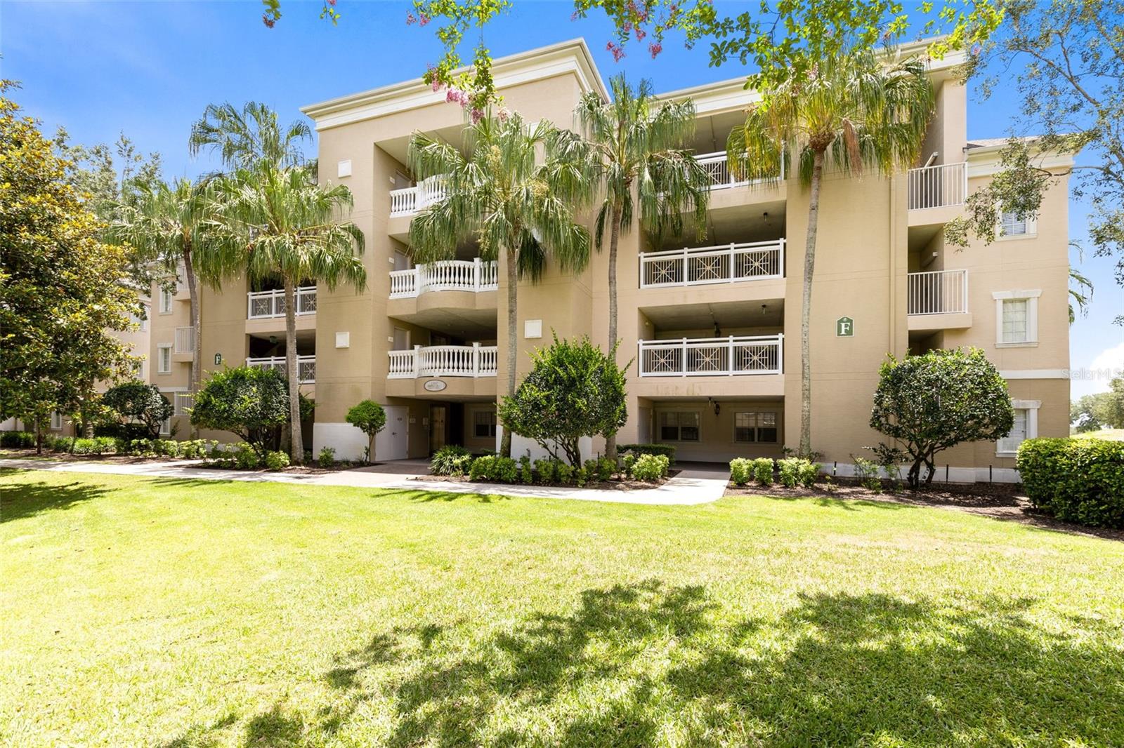 Rare to market elegantly appointed second-floor corner condominium in one of the sought-after buildings in Reunion Resort’s popular Centre Court Ridge neighborhood. This property embodies the golden rule of real estate: location, location, location. First, you will enjoy stadium-like views of the 12th hole of the Tom Watson signature golf course from the property’s south-facing balcony as well as breathtaking sunset views of the surrounding course and conservation, as you are so close you will feel like you are playing along. Second, as you step out of your condominium you will be right across from the resort pool with hot tub, the award-winning tennis and pickleball complex and the resort’s miniature golf course. Third, you will be positioned at the heart of the resort just a short distance to the clubhouse, Starbucks and most of the resort’s bars and restaurants including the Sushi Bar, The Chophouse and the 11th-floor tapas-style restaurant and cocktail bar where nightly views of the Disney fireworks are part of the scenery. In a vacation rental program with future bookings that can convey, the property comes fully furnished and completely turnkey, ready for immediate enjoyment for long- or short-term rental or use as a private vacation home. The Centre Court condominiums provide many upgraded features such as granite countertops, stainless steel appliances, crown molding and tray ceilings all as standard and the split floor plan with attached baths to each bedroom allows maximum privacy for all guests. The condominium comes with an active Reunion Resort membership to provide the option of full access to all the resort’s amenities including 10 swimming pools, on-site water park and resort shuttle. Reunion Resort is a 2,300-acre golf and tennis community, just six miles to Disney and the parks, and a short drive to Orlando International Airport. Call us today for your tour of this lovely resort property.