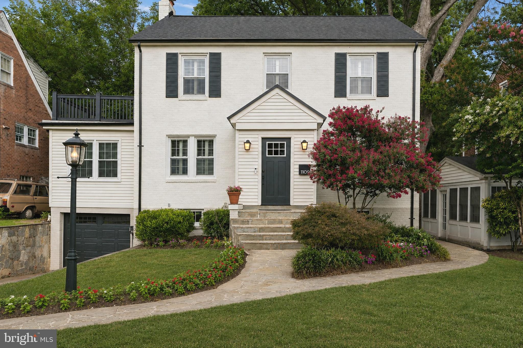 Beautifully updated colonial with four finished levels in Arlington's desirable Lacey Forest neighborhood, just a short walk to Historic Westover Village. Featuring four bedrooms, three full baths, and one half bath, this exceptional home offers the perfect combination of timeless character, modern updates, and versatile living spaces. Freshly limewashed brick and a brand-new architectural roof (2026) create outstanding curb appeal and lasting peace of mind.Inside, you'll find hardwood floors, a sun-filled living room anchored by a wood-burning fireplace, a formal dining room, a private main-level office, and an updated kitchen with island, pantry, and a spacious breakfast area overlooking the backyard. Designed for both everyday living and entertaining, the thoughtful floor plan offers generous living spaces filled with natural light. The home also holds a PEARL Silver Certification recognizing verified high-performance and energy-efficient features, including air sealing, high-performance attic insulation, insulated crawlspace, and verified duct tightness.The finished third level provides exceptional bonus space ideal for a playroom, media room, fitness studio, hobby room, or additional living area. The fully finished lower level features an in-law suite with a second kitchen, bedroom, full bath, and spacious living area. Ideal for multigenerational living, the flexible space also functions beautifully as a nanny suite, au pair suite, private guest quarters, or extended-stay accommodations.Step outside to enjoy a fully fenced backyard featuring an elevated deck, patio, and thoughtfully designed outdoor living space—perfect for relaxing, entertaining, or everyday enjoyment. Additional highlights include a built-in garage equipped with an electric vehicle charger.